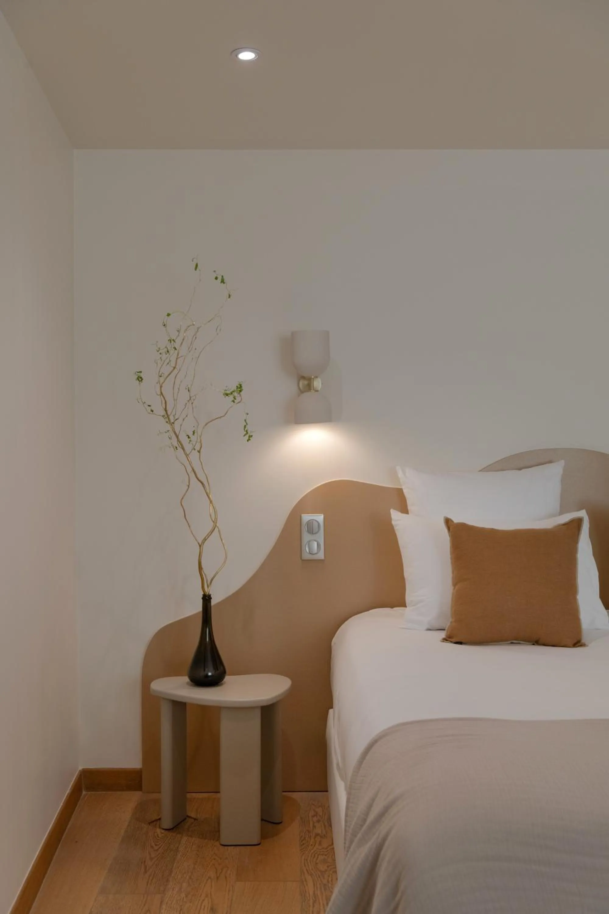 Bed in MiHotel Le Gourguillon