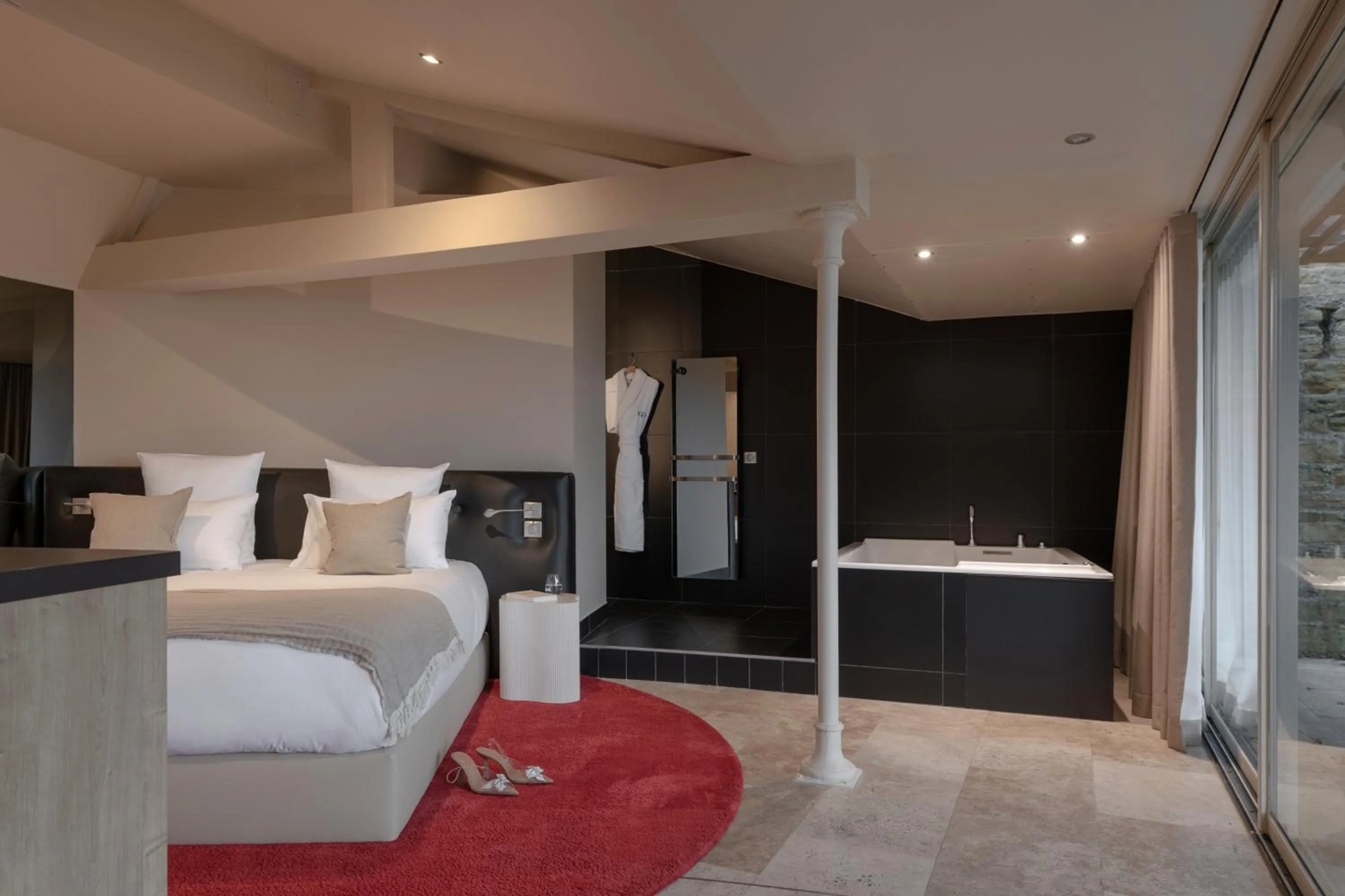 Bed in MiHotel Le Gourguillon