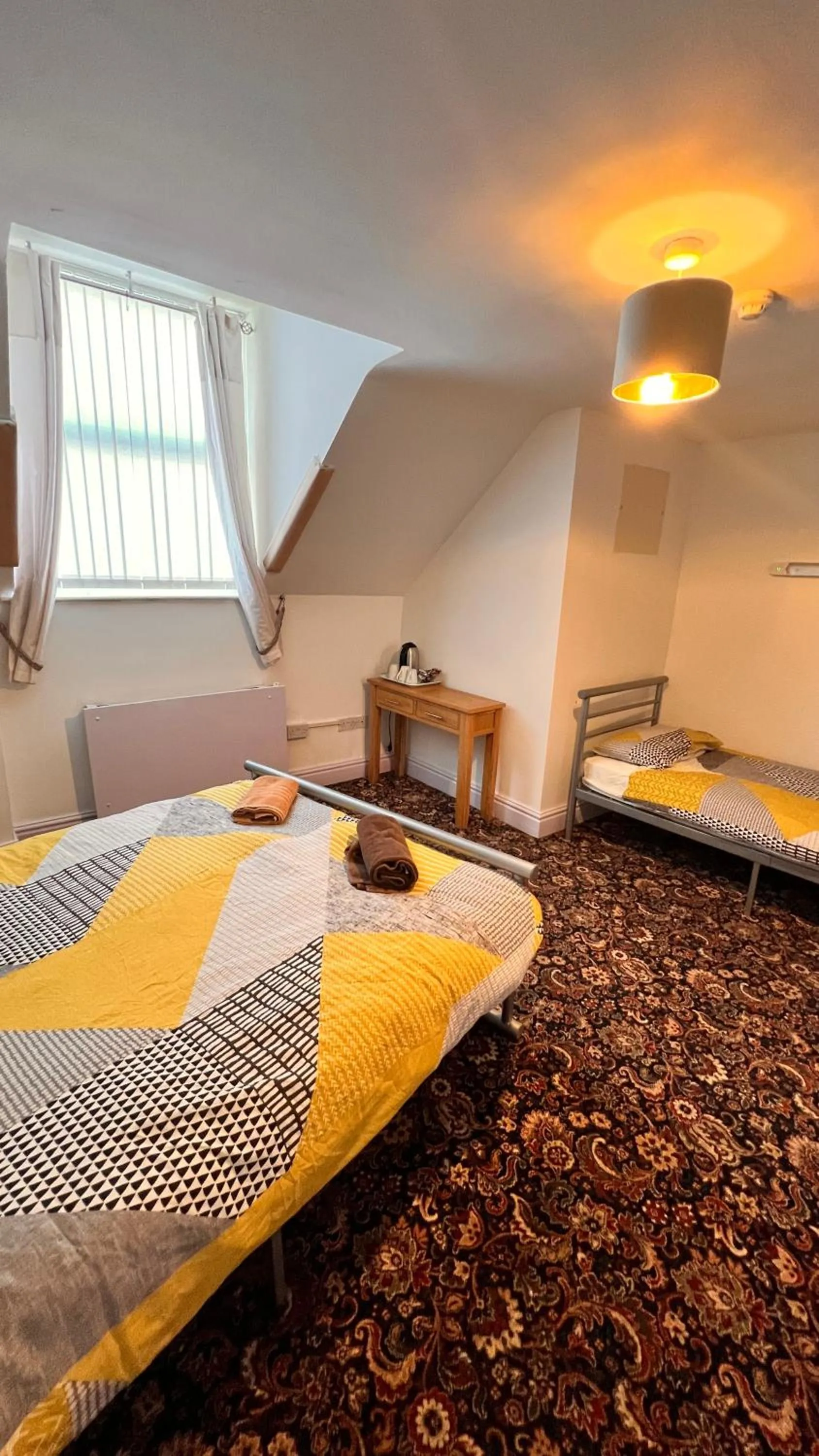 Photo of the whole room, Bed in Castle Lodge Guest House 86-88 Sheil Rd L6 3AF