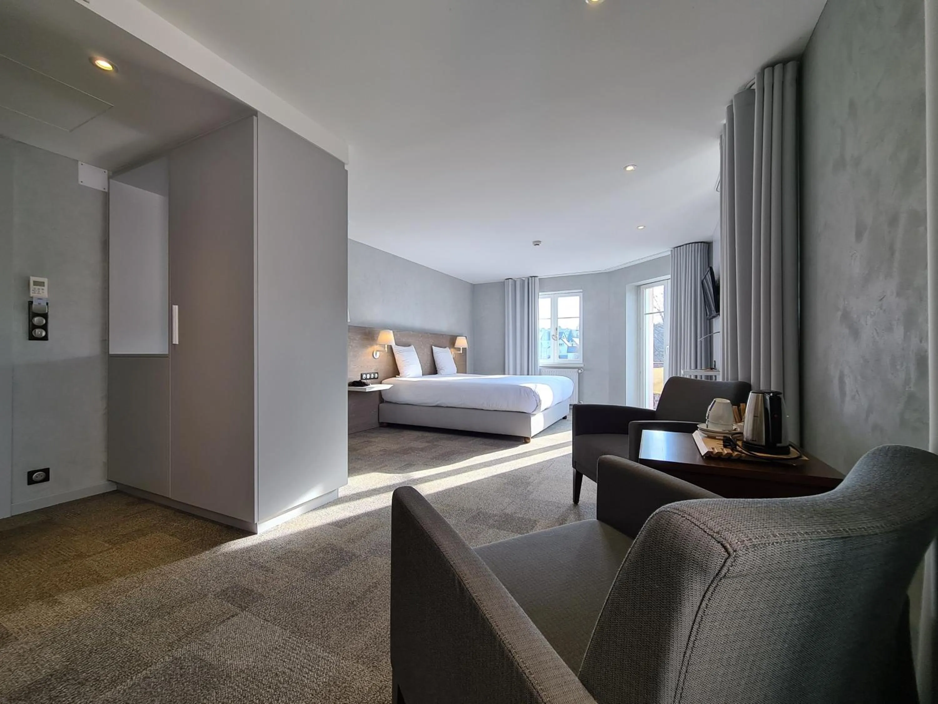 Bed in Maison Jenny Hotel Restaurant & Spa