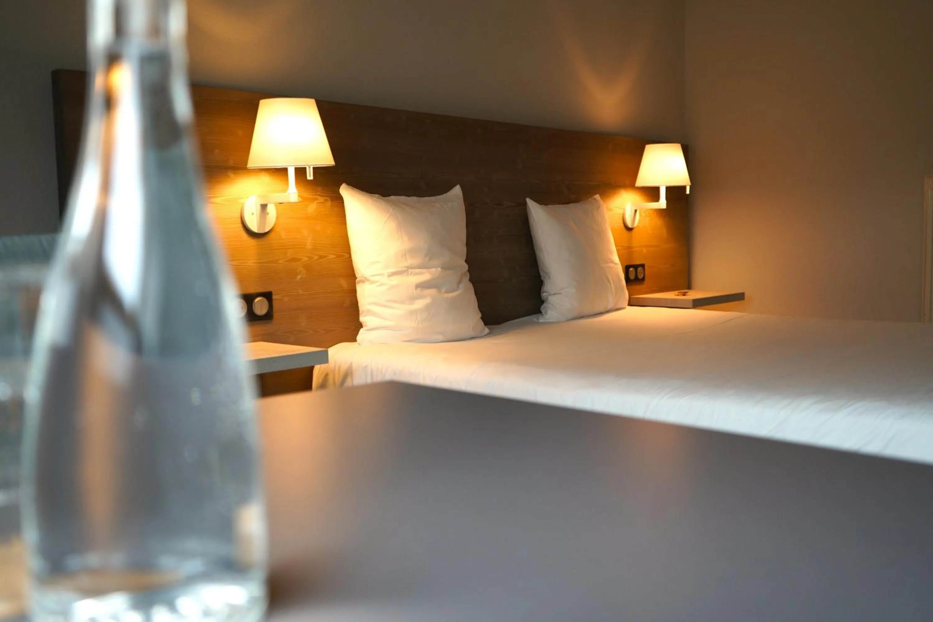 Bed in Maison Jenny Hotel Restaurant & Spa