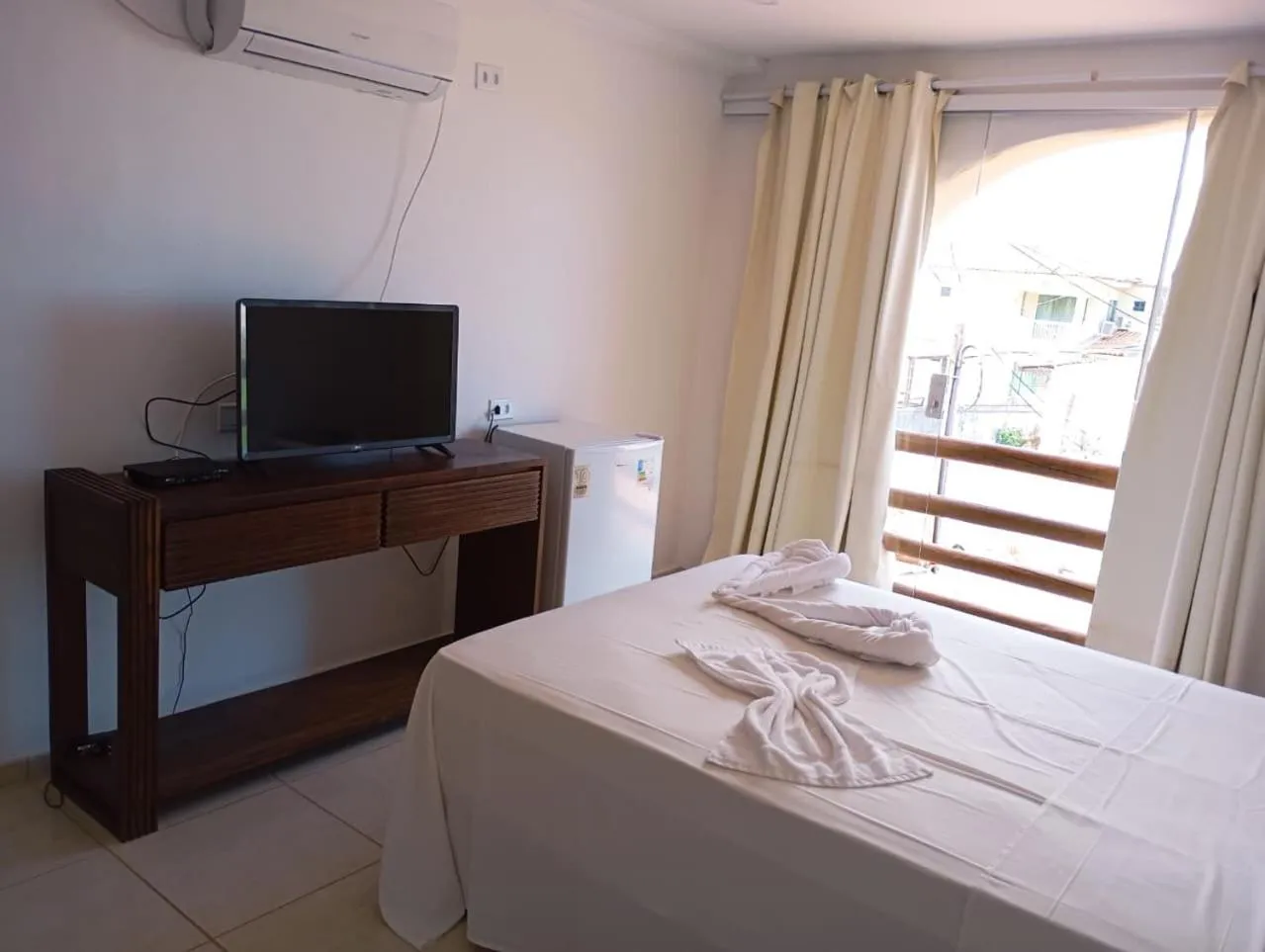 Bed in Pousada Água de Fuego