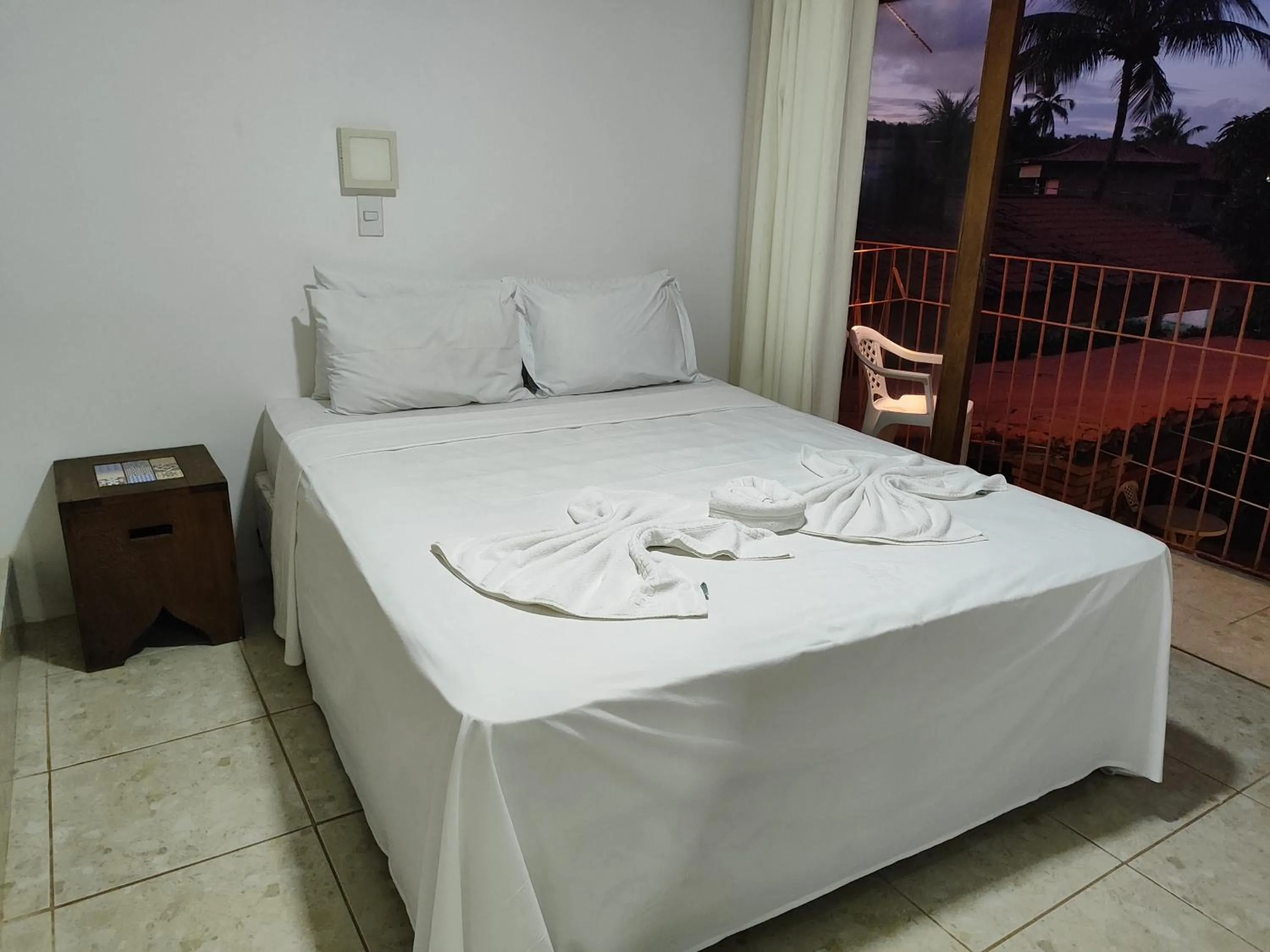 Bed in Pousada Água de Fuego