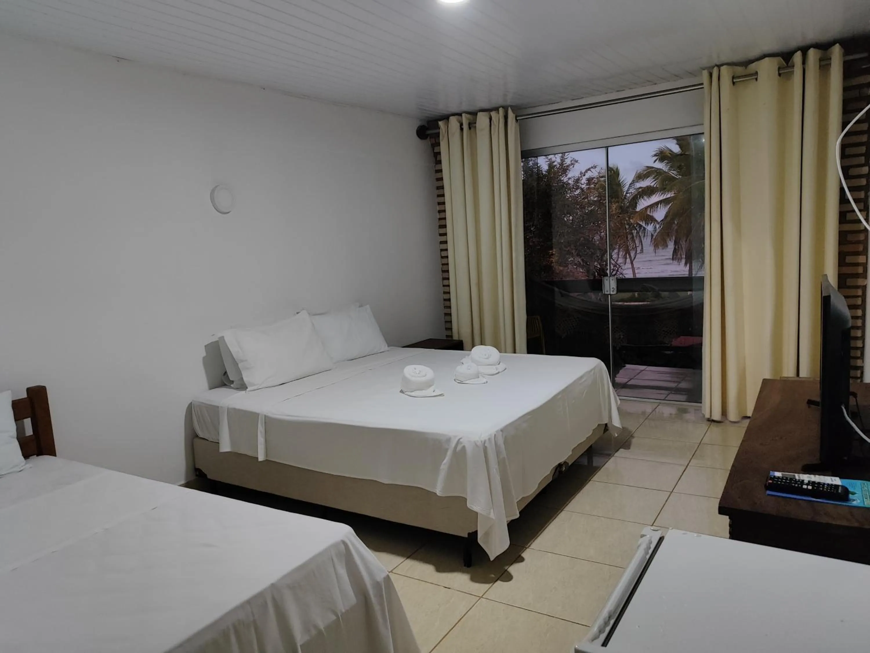 Bed in Pousada Água de Fuego