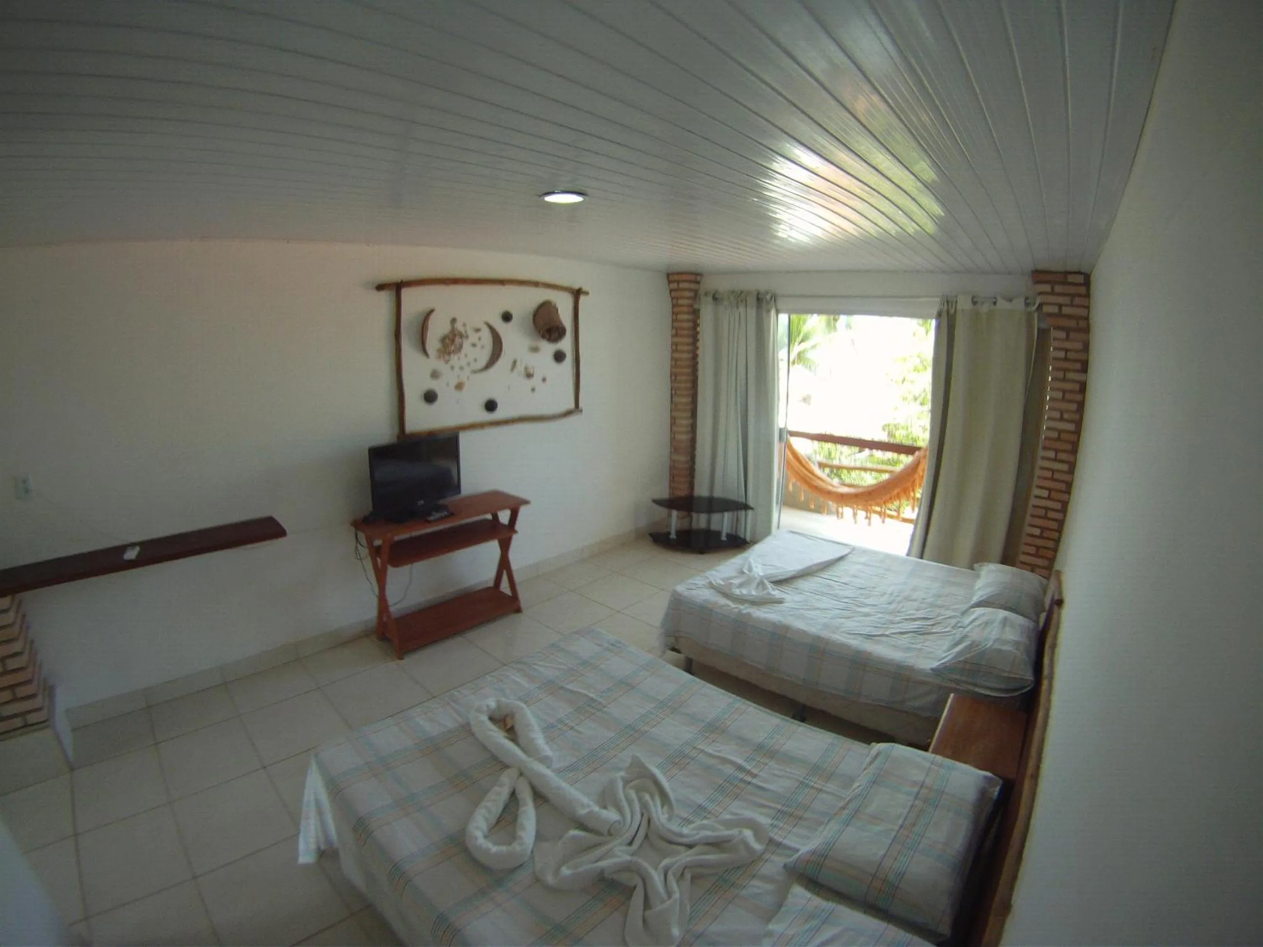 Bed in Pousada Água de Fuego