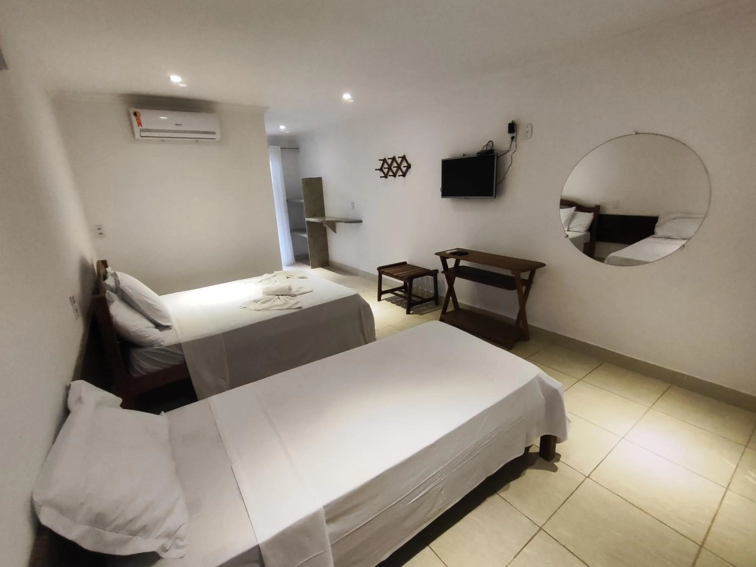 Bed in Pousada Água de Fuego