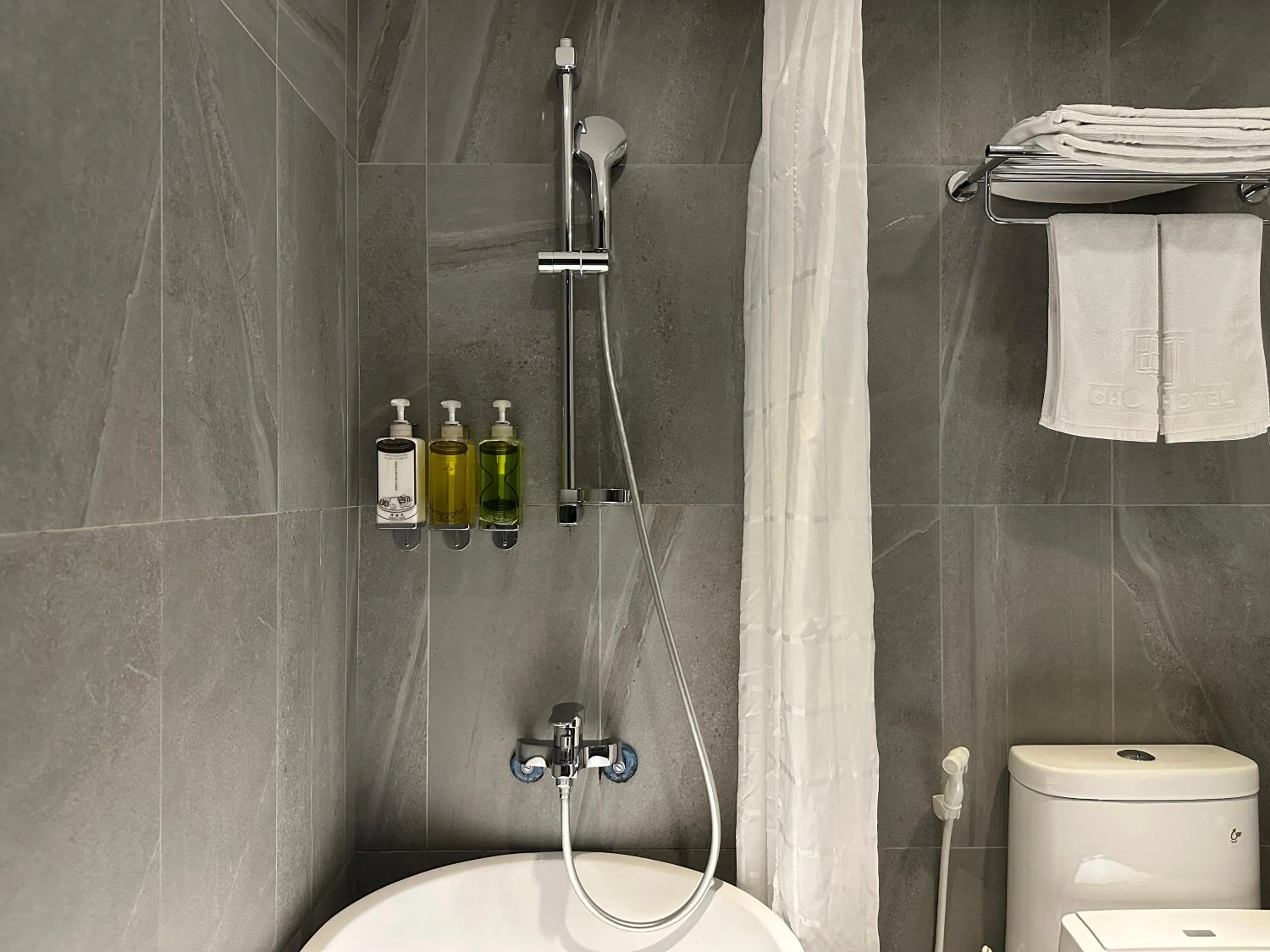 Bathroom in Cho Hotel 3