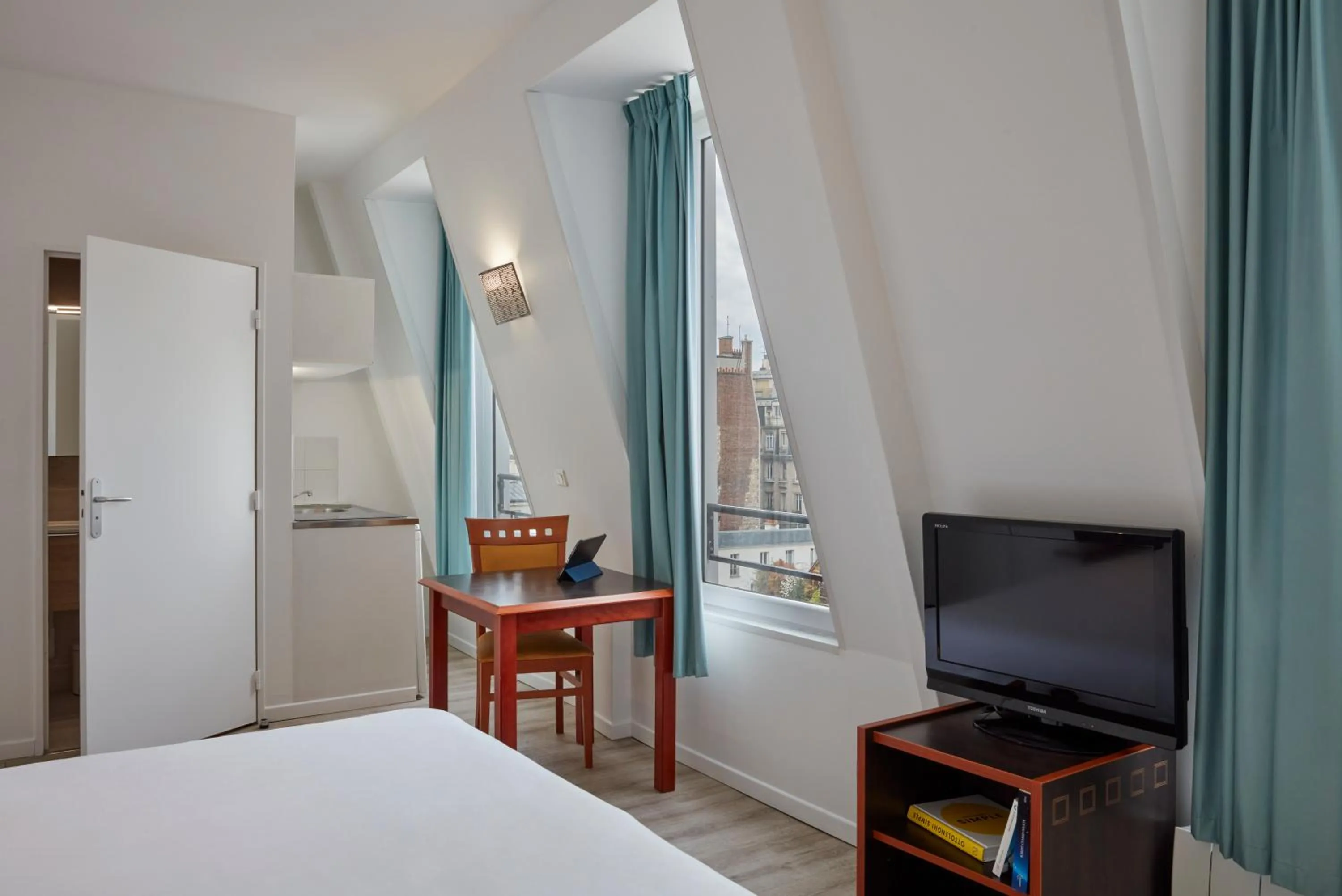 Bedroom, Bed in Aparthotel Adagio Access Paris Philippe Auguste