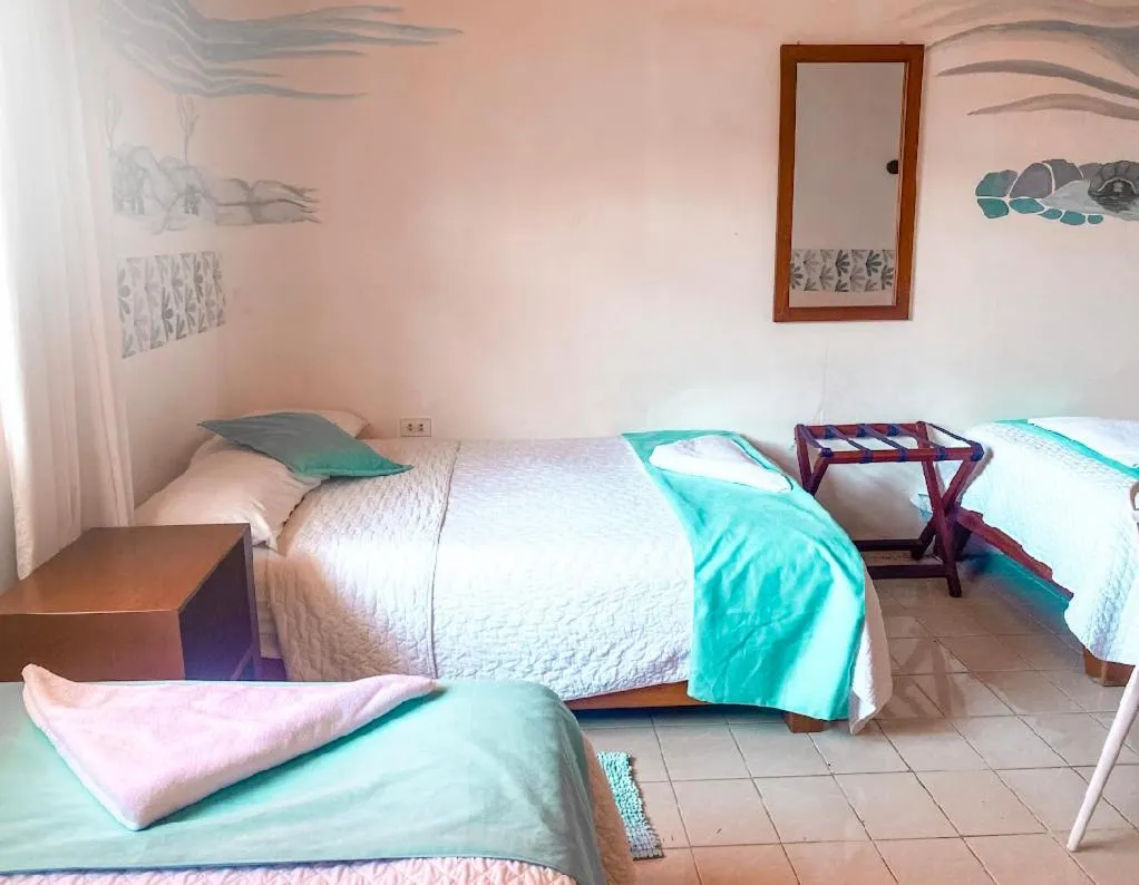 Bed in Hotel Coral Blanco with high speed internet Starlink and Galapagos Tour Operator