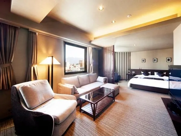 Bed in Silk Inn Kagoshima