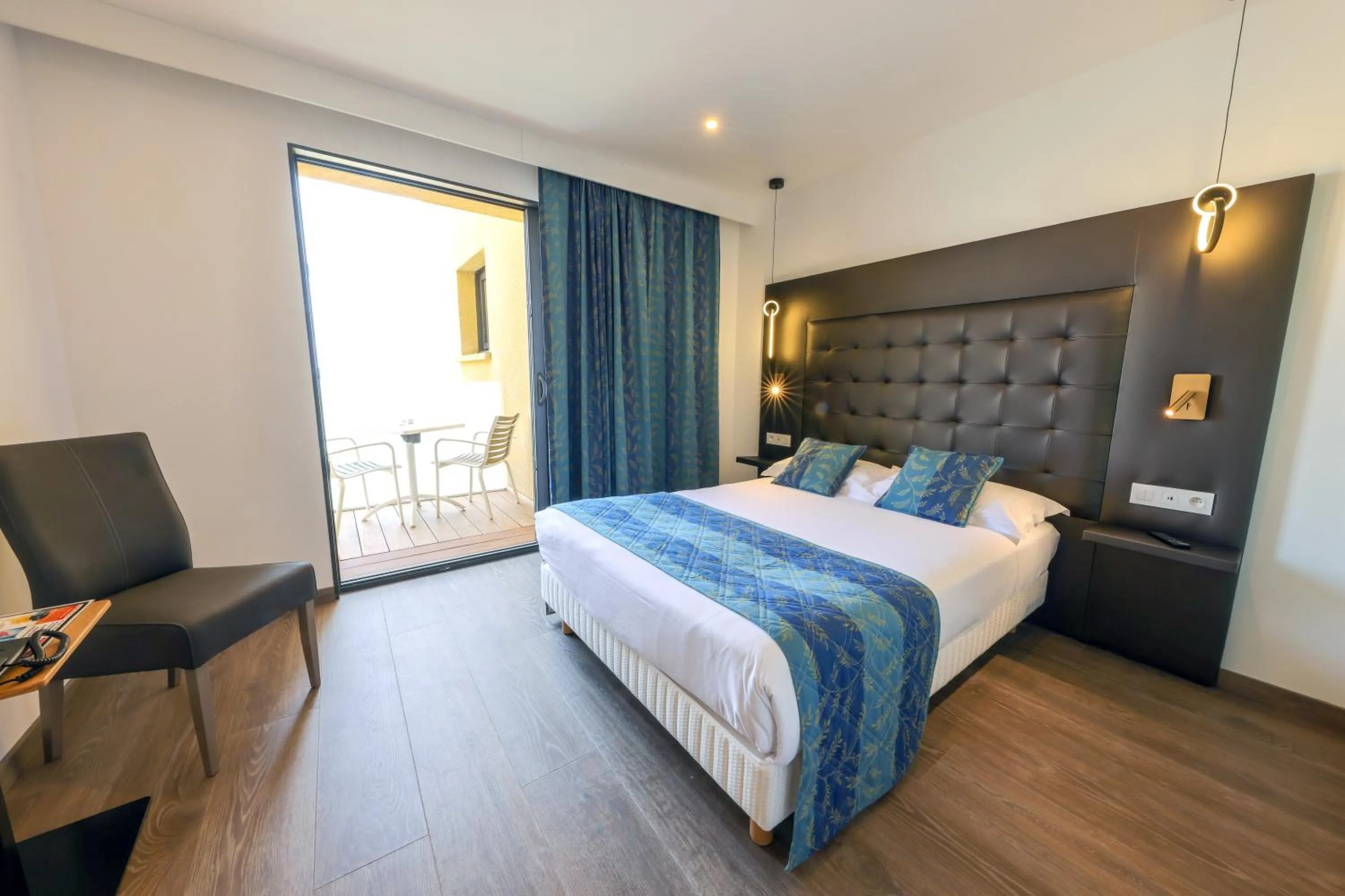 Bed in Hotel Saint Christophe