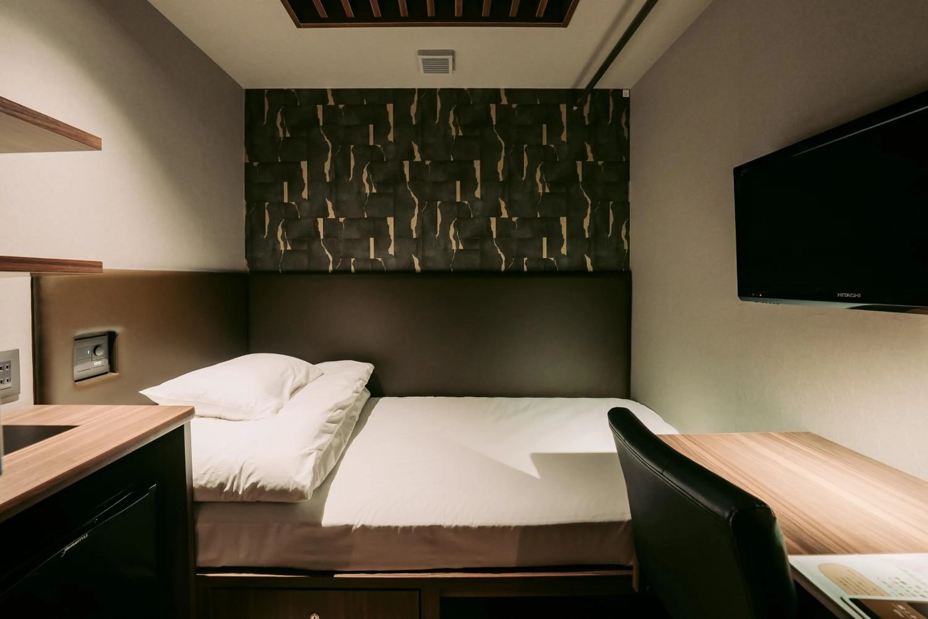 Bed in Tanegashima Araki Hotel