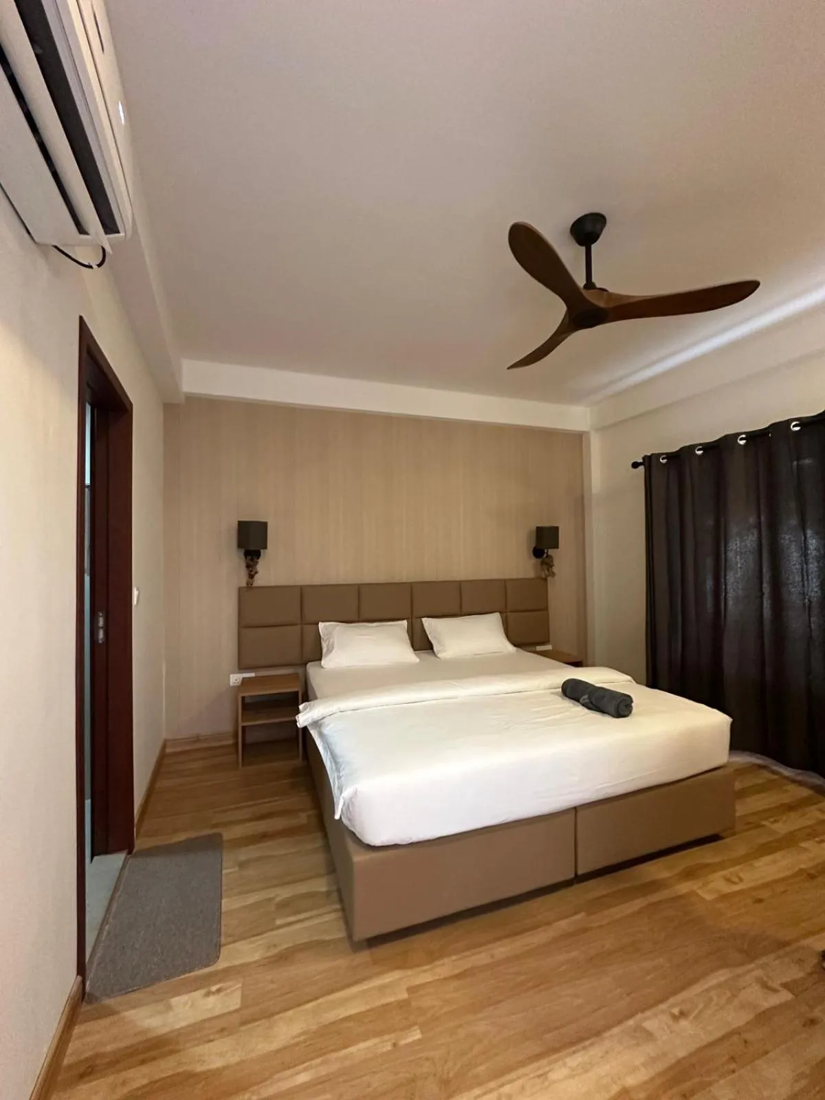 Bed in Club Kaafu Maldives