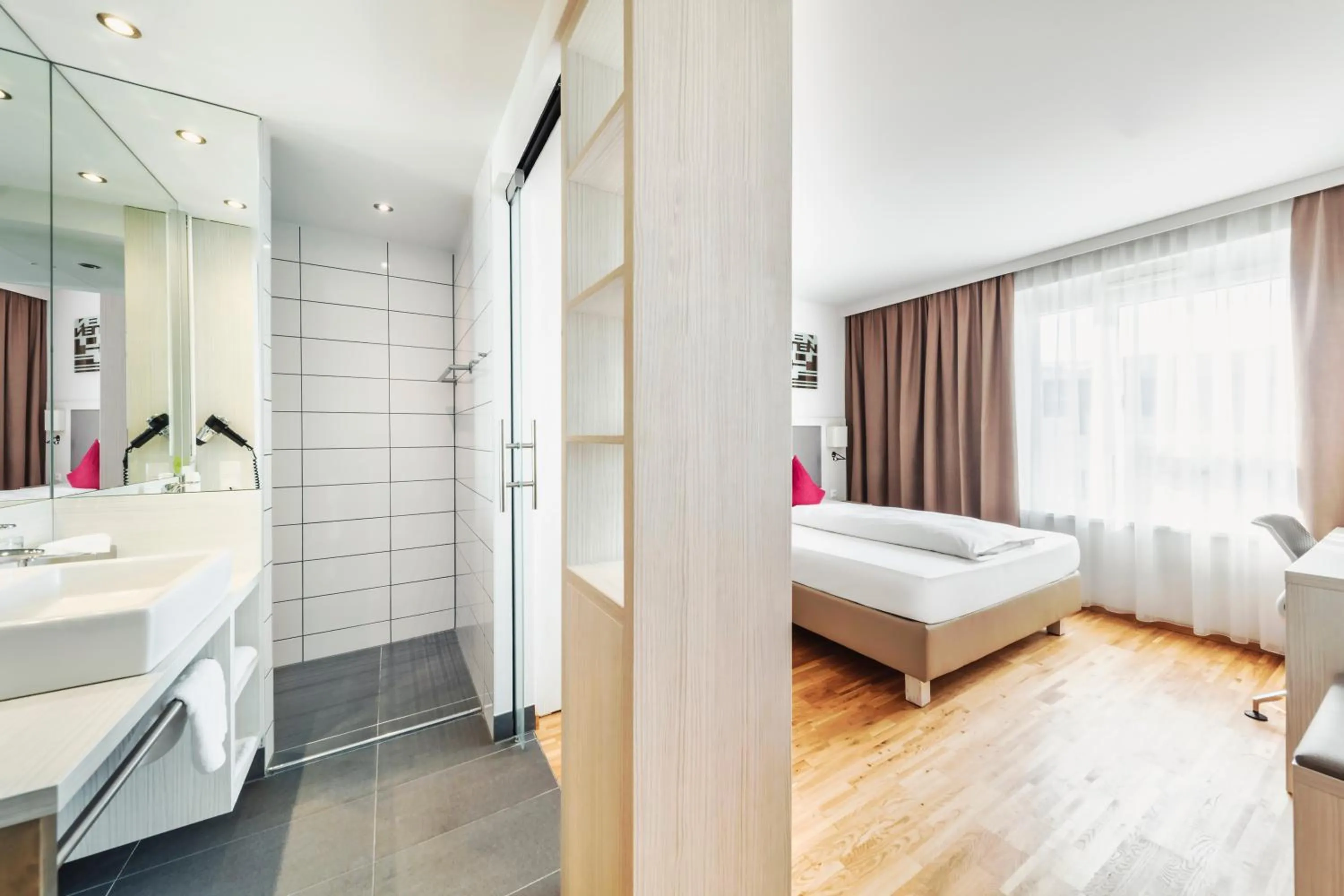 Bathroom, Bed in Hotel Zeitgeist Vienna Hauptbahnhof