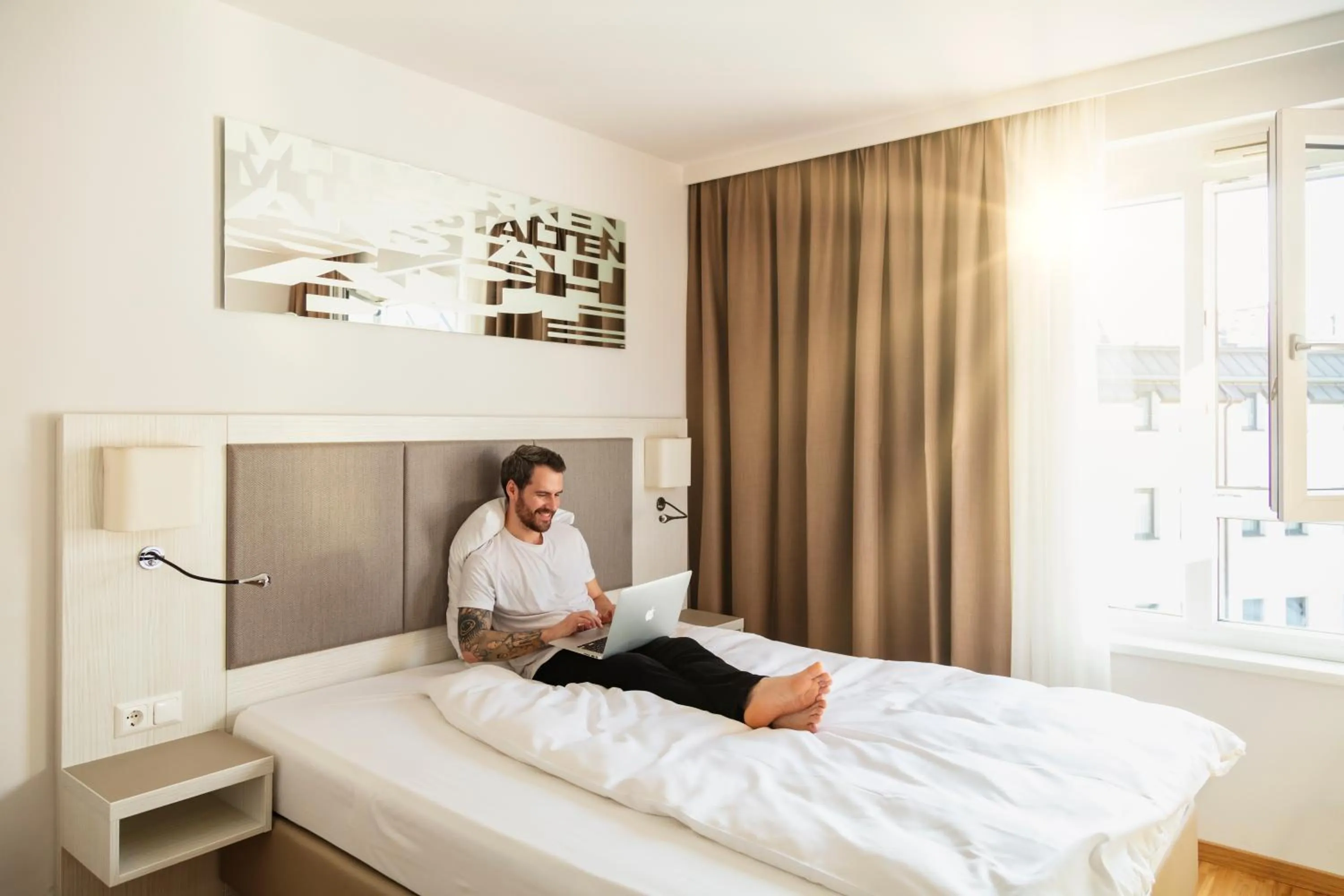 Bed in Hotel Zeitgeist Vienna Hauptbahnhof