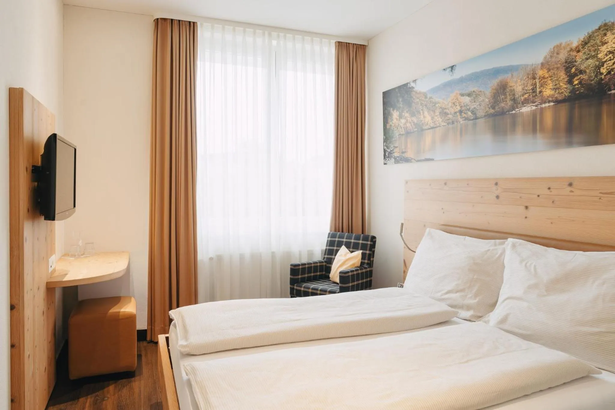 Bed in Boutique Hotel Waldegg - Self-Check-in