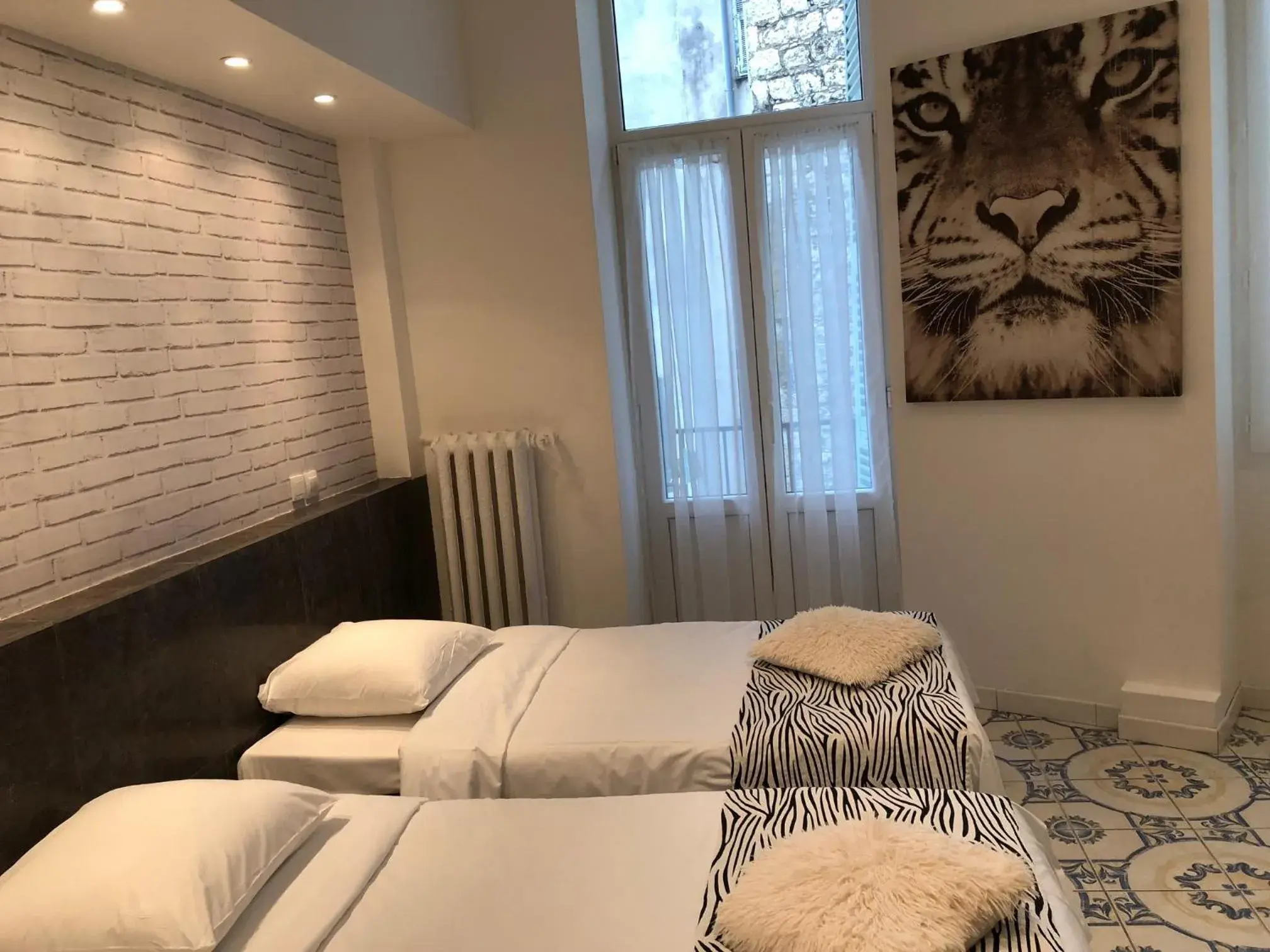 Quadruple Room in Interlaken Quadruple Room in Interlaken