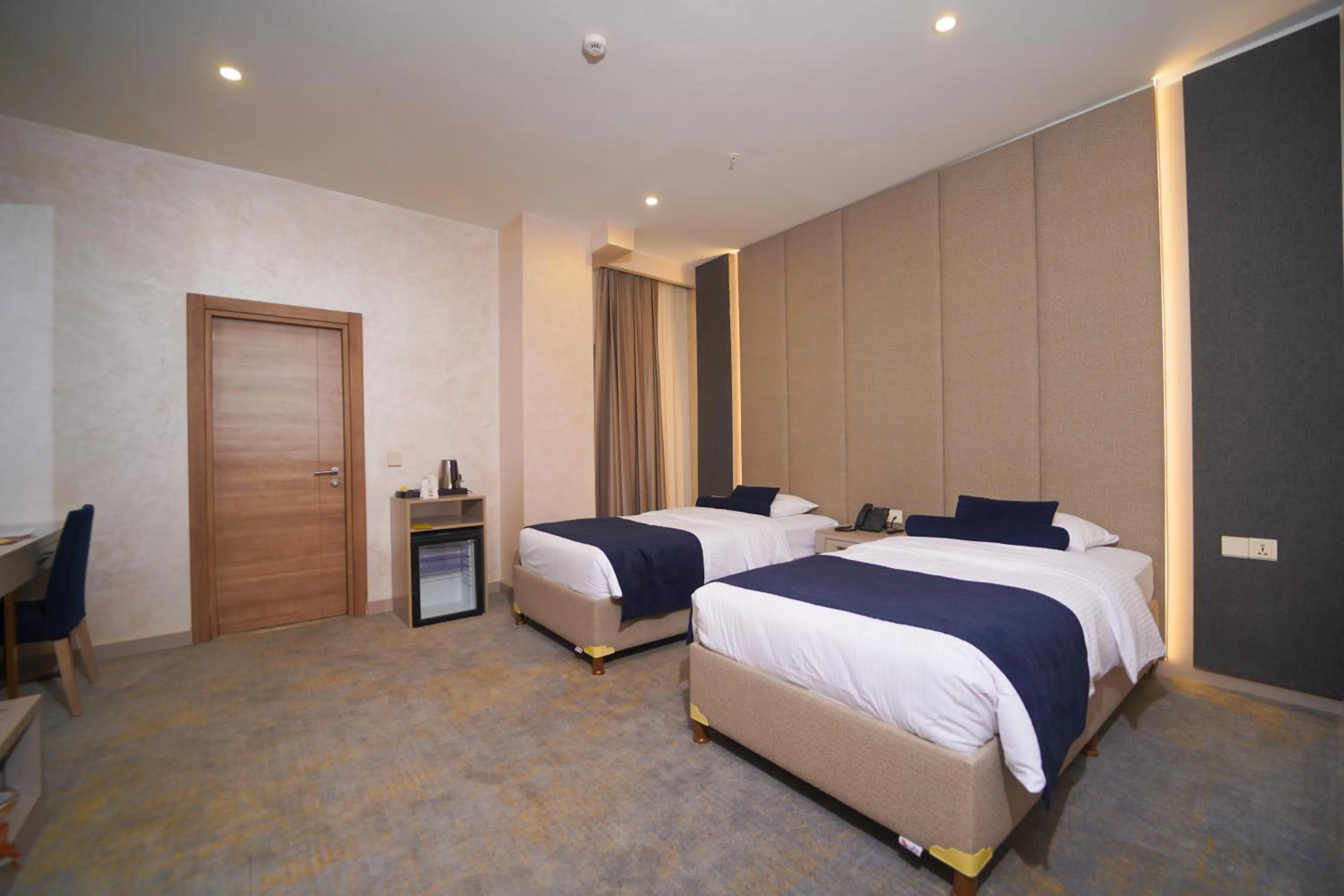 Bed in Darin Plaza Hotel