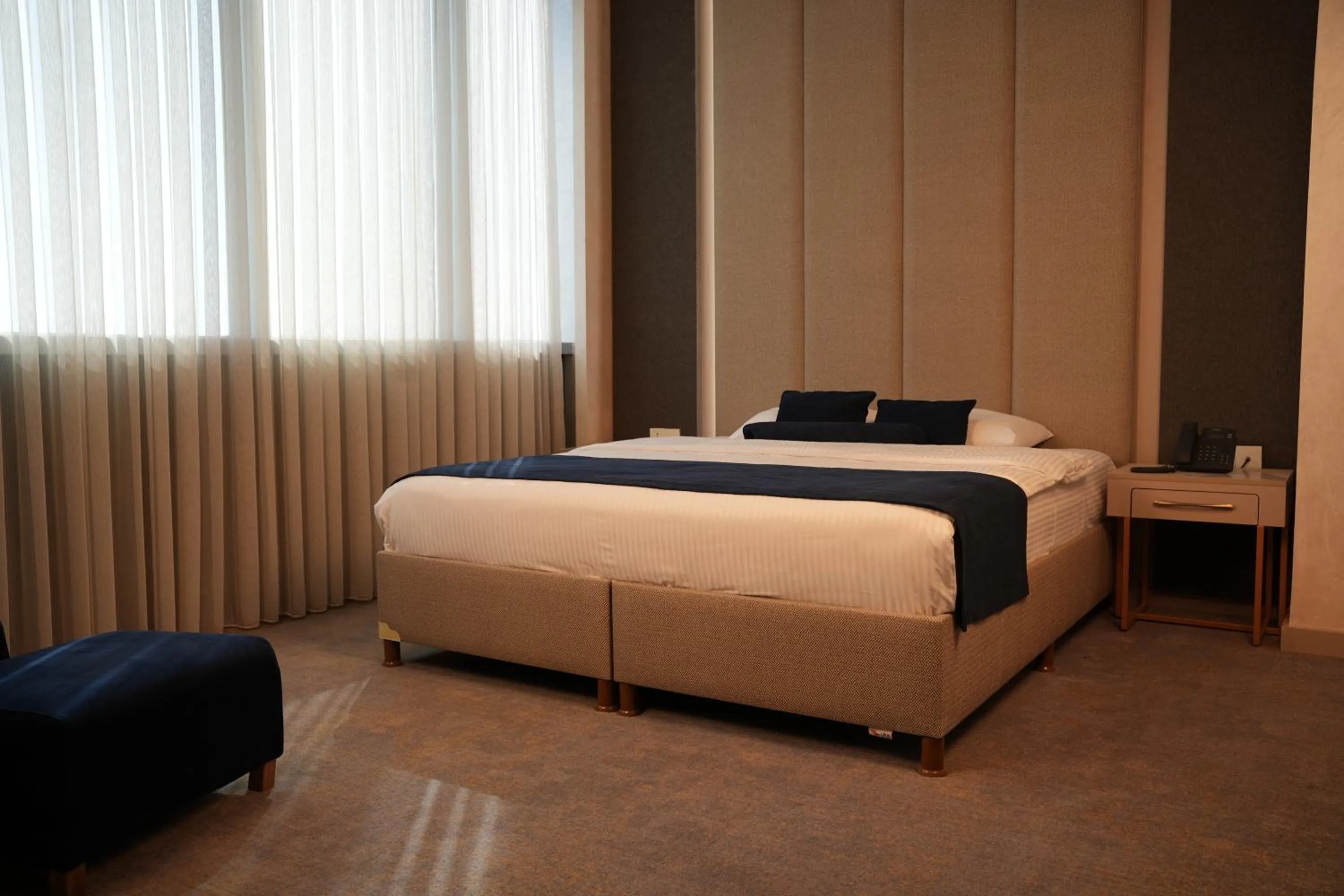 Bed in Darin Plaza Hotel