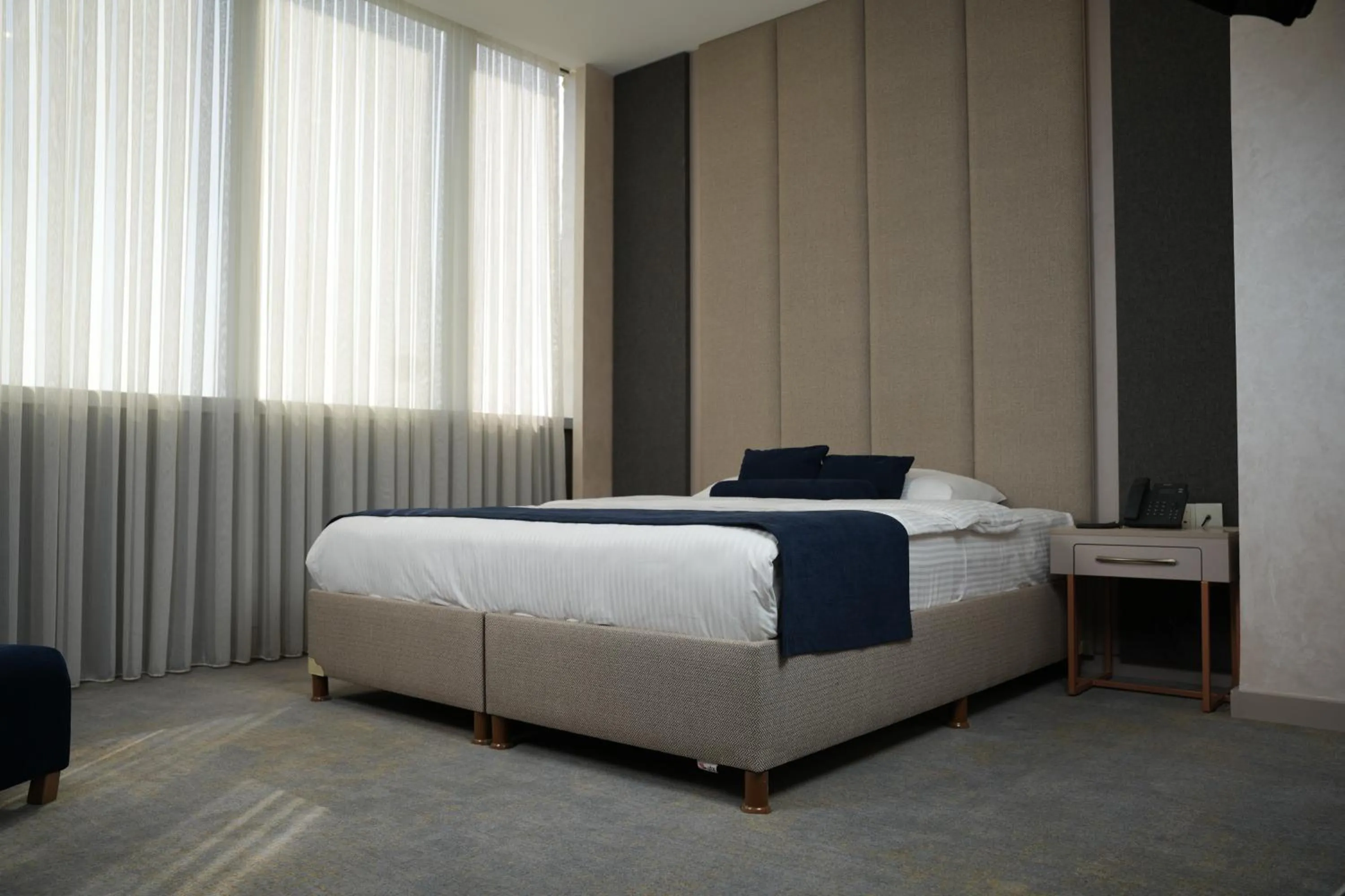 Bed in Darin Plaza Hotel