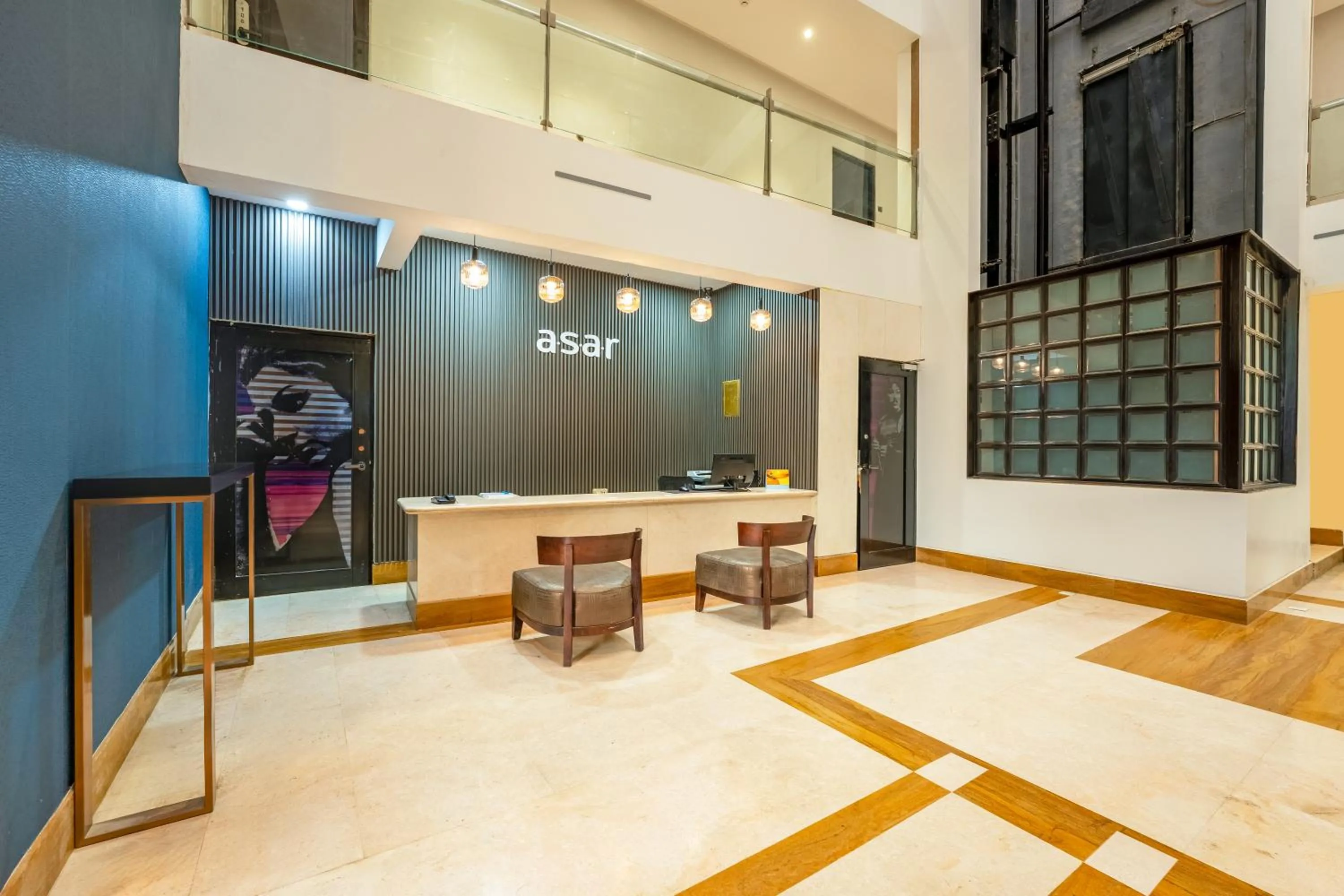 Lobby or reception in asar Landmark Suites Mumbai International Airport by Orion Hotels