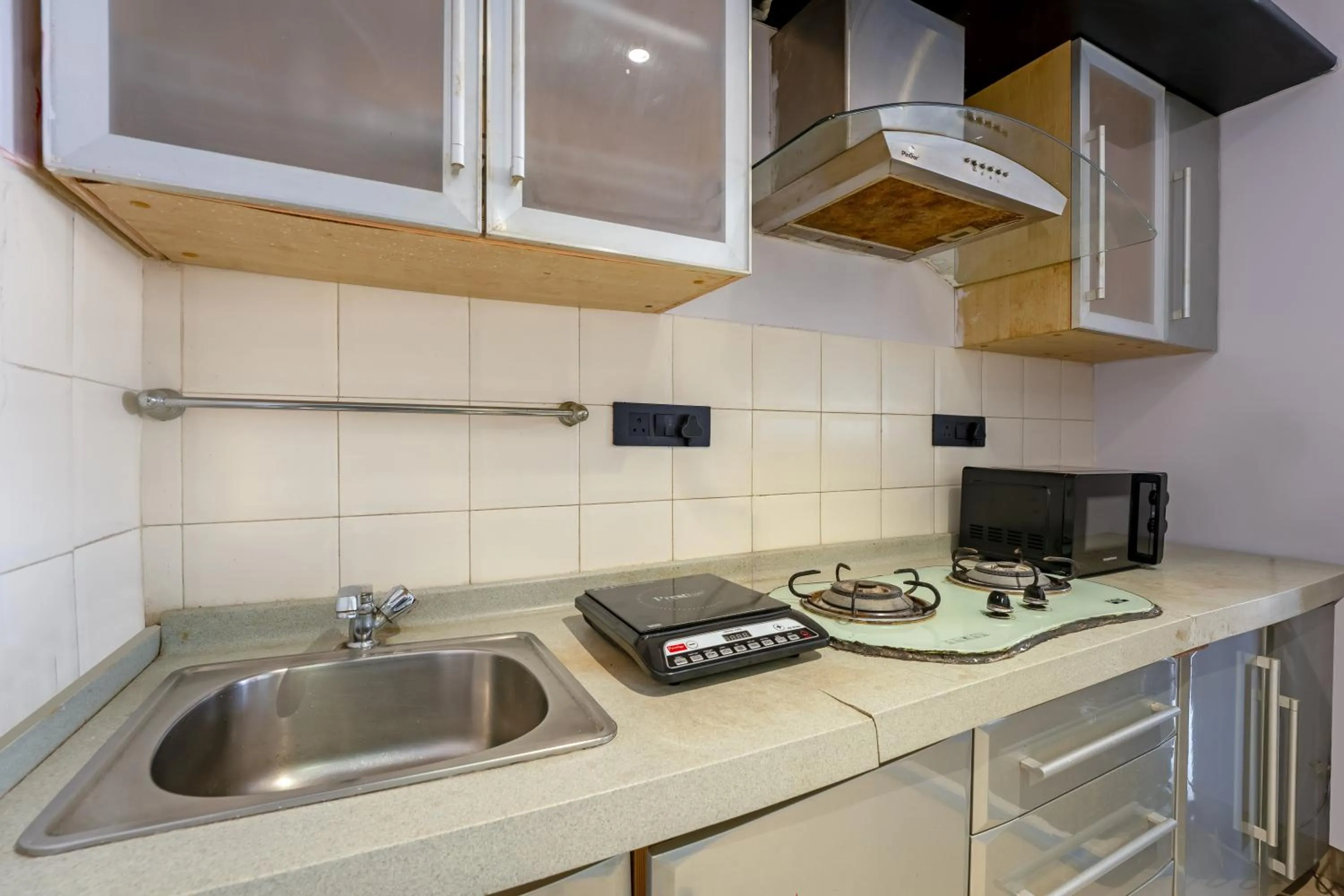 Kitchen or kitchenette in asar Landmark Suites Mumbai International Airport by Orion Hotels