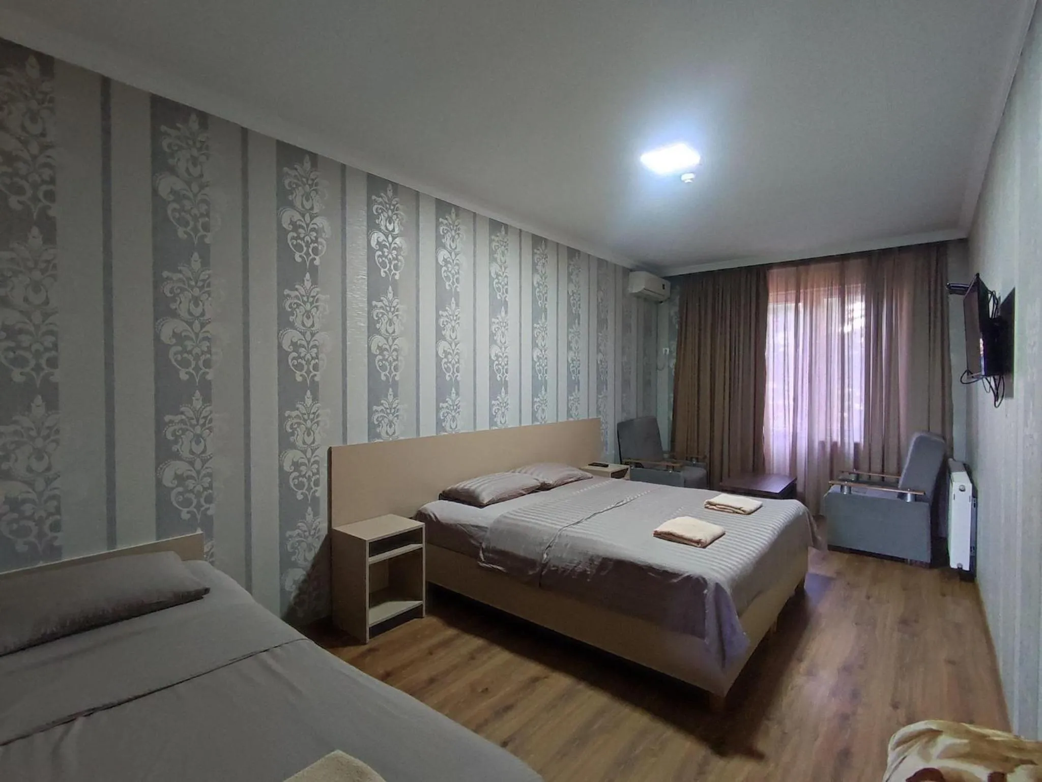 Living room, Bed in Hotel VENUS