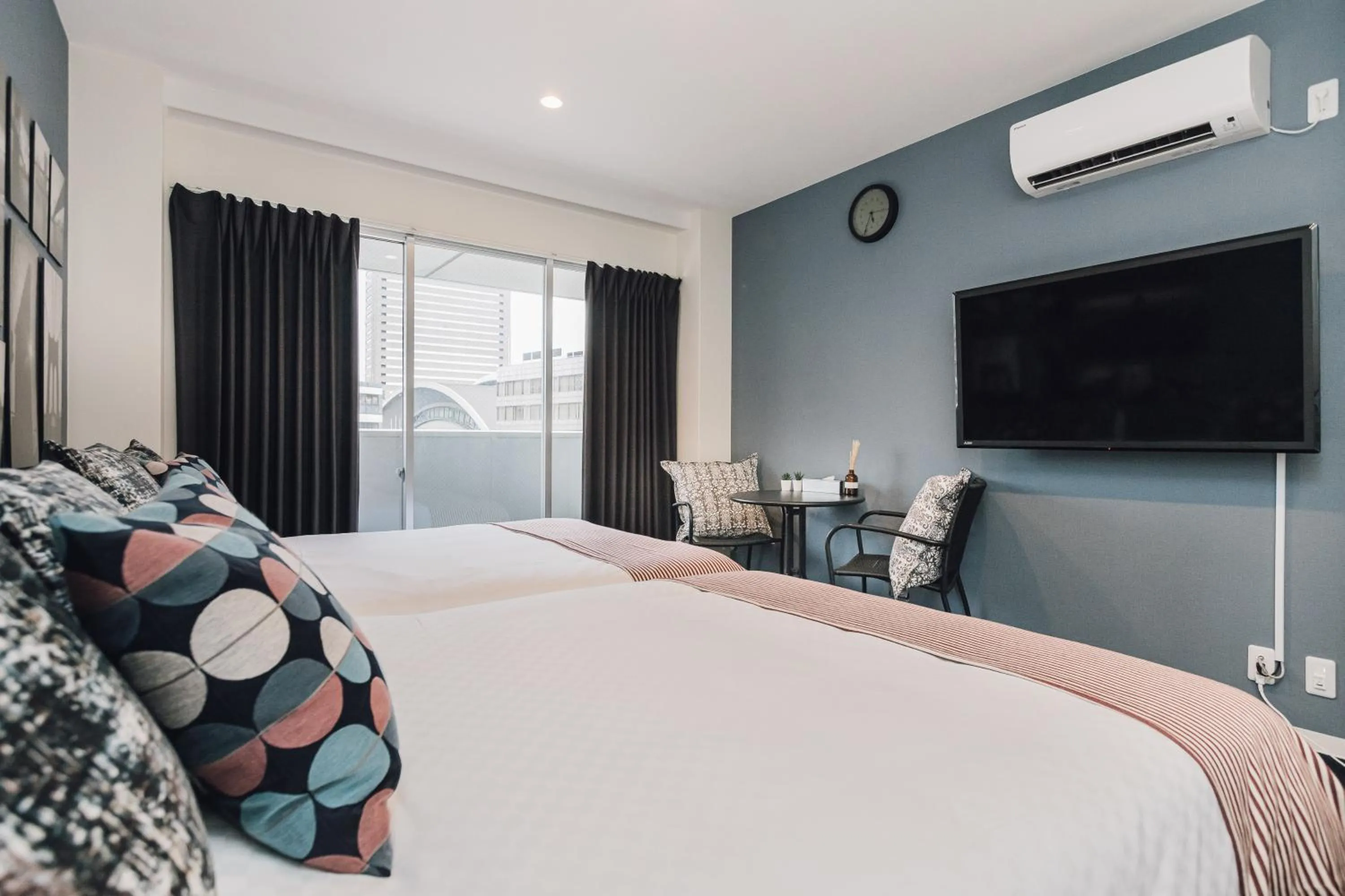 Bed in Namba Garden Square Apartment