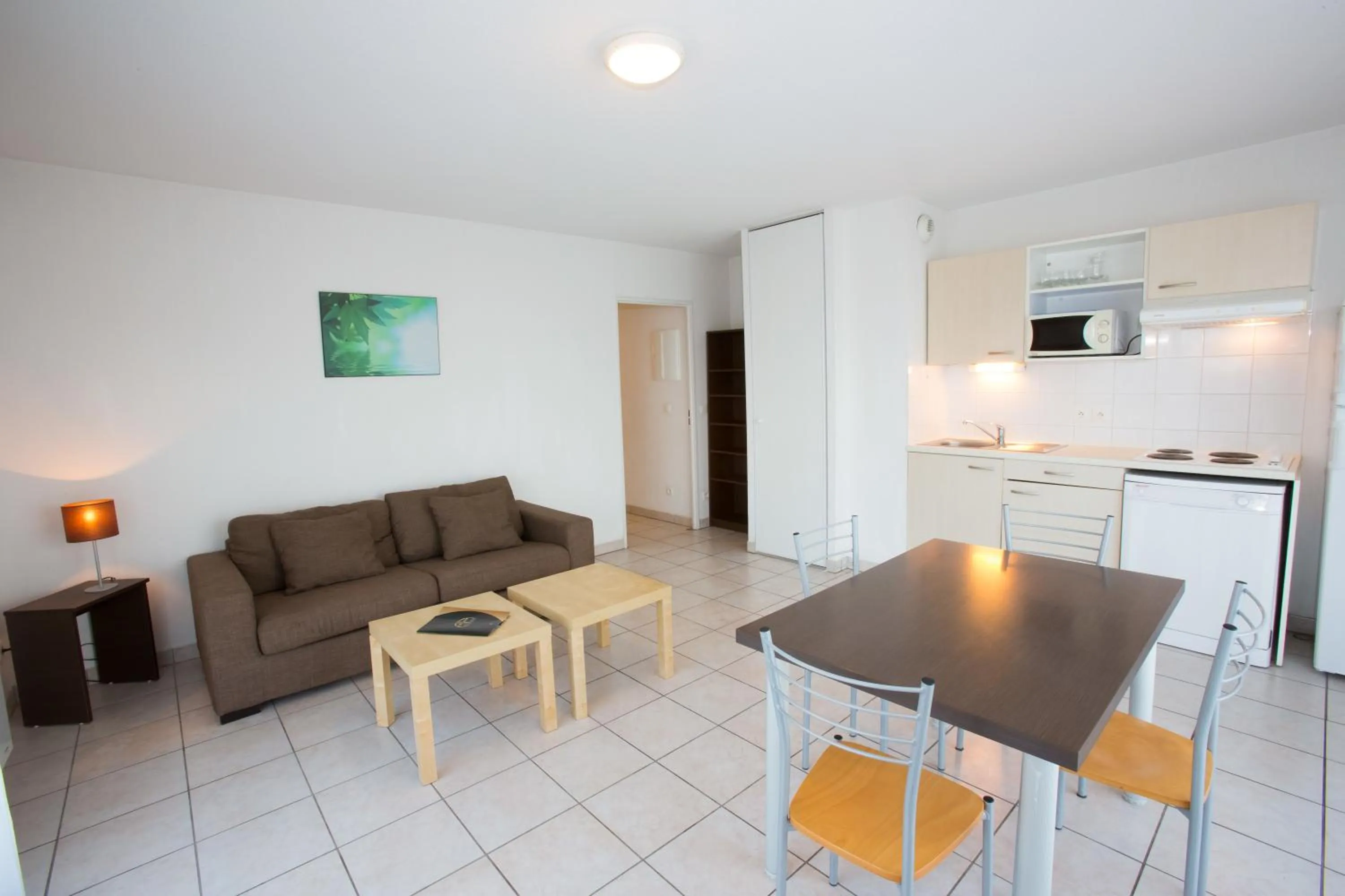 Kitchen or kitchenette in All Suites Appart Hôtel - Bordeaux - Mérignac Aéroport