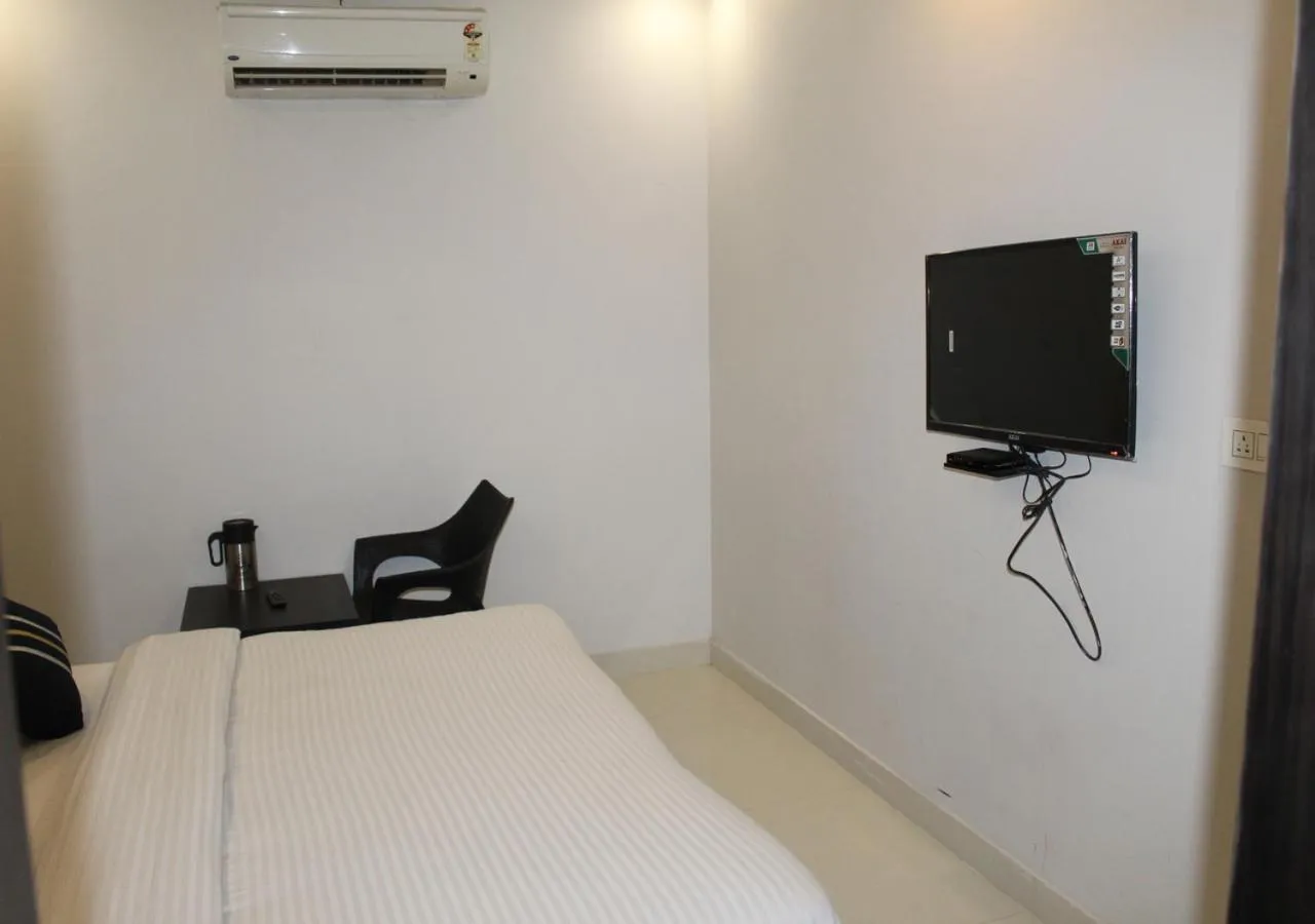 Communal lounge/ TV room, Bed in HOTEL SHIVAYE