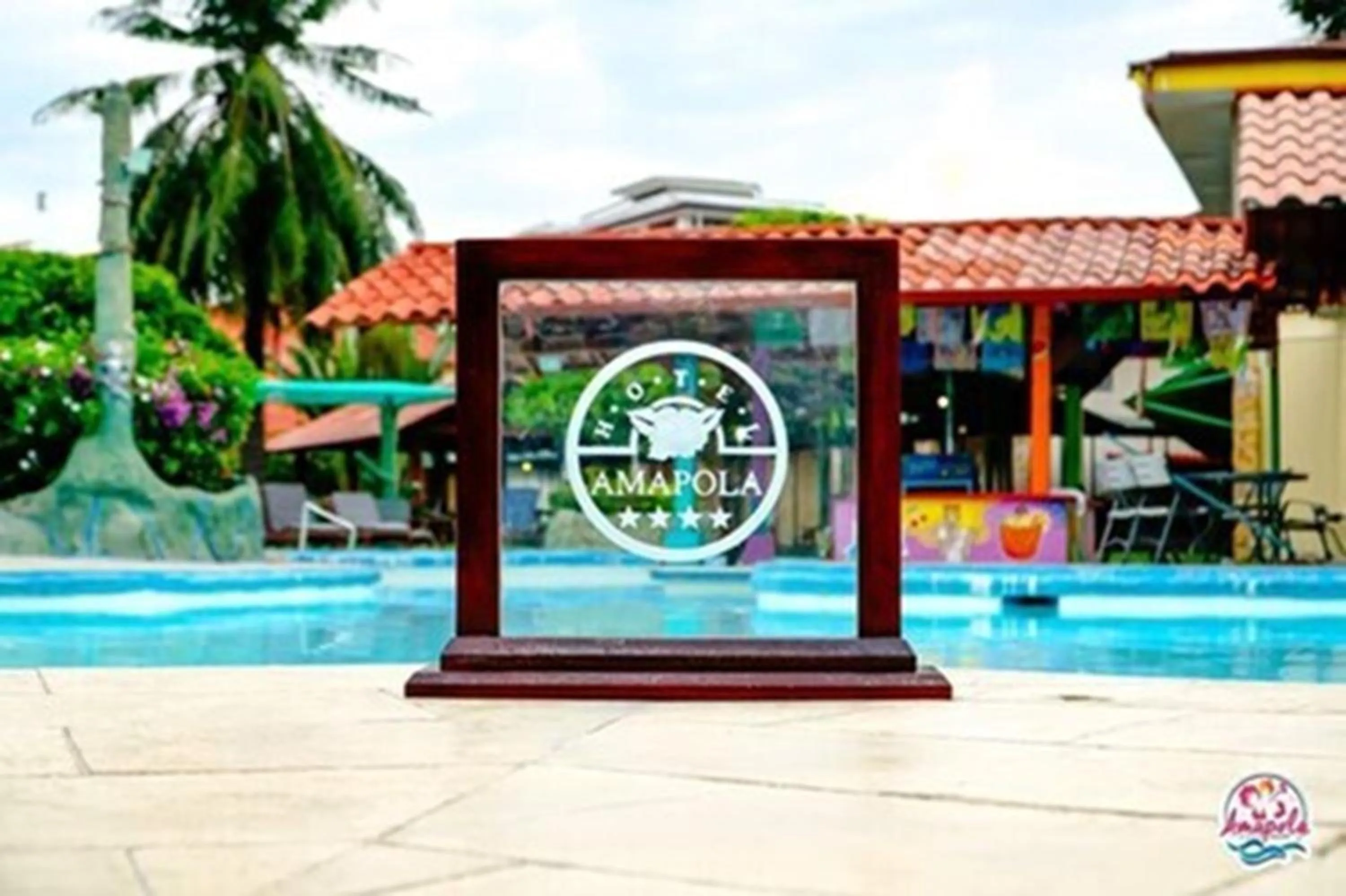 Swimming pool in Amapola Resort