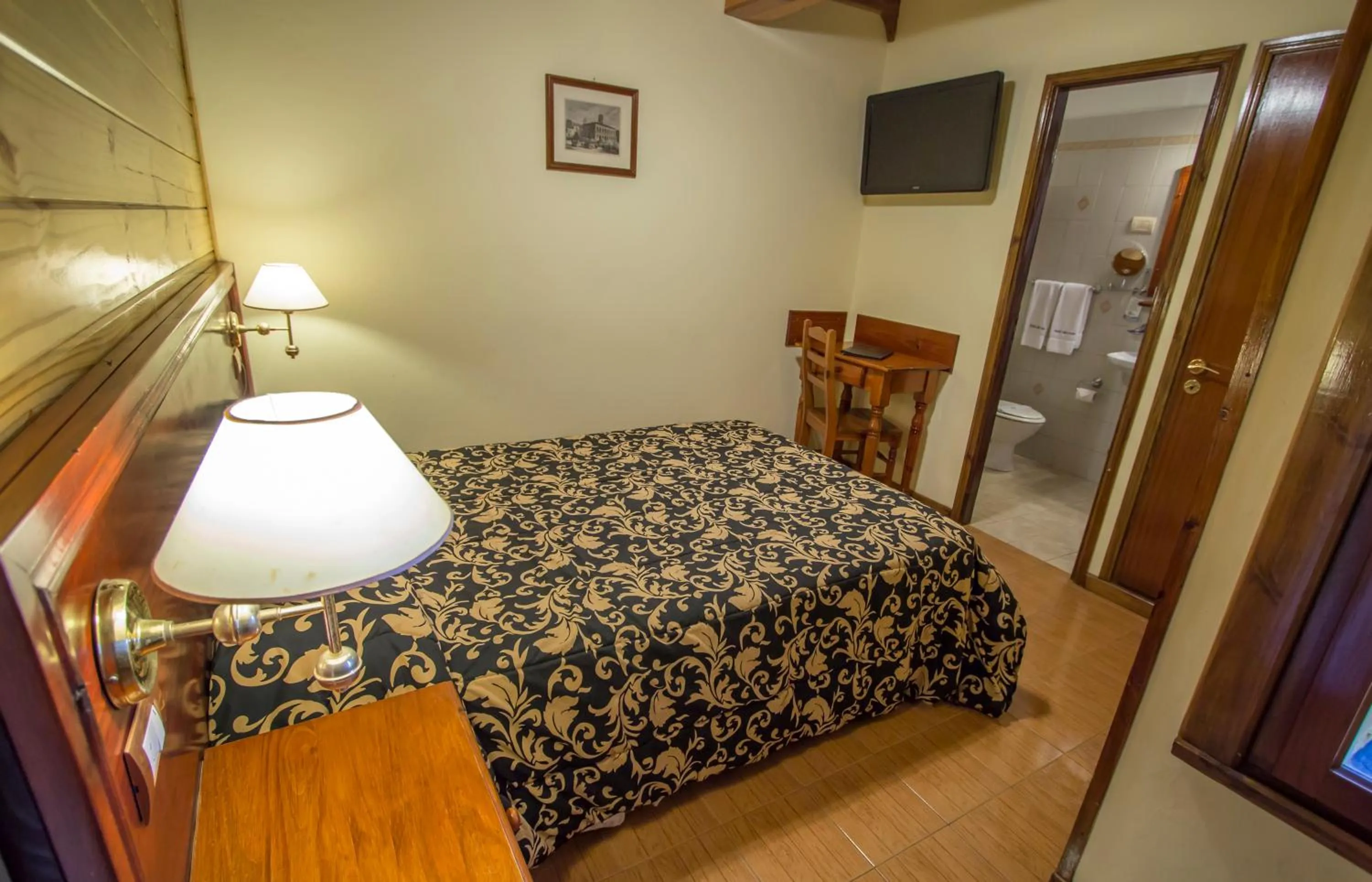 Bed in Hosteria Sirenuse