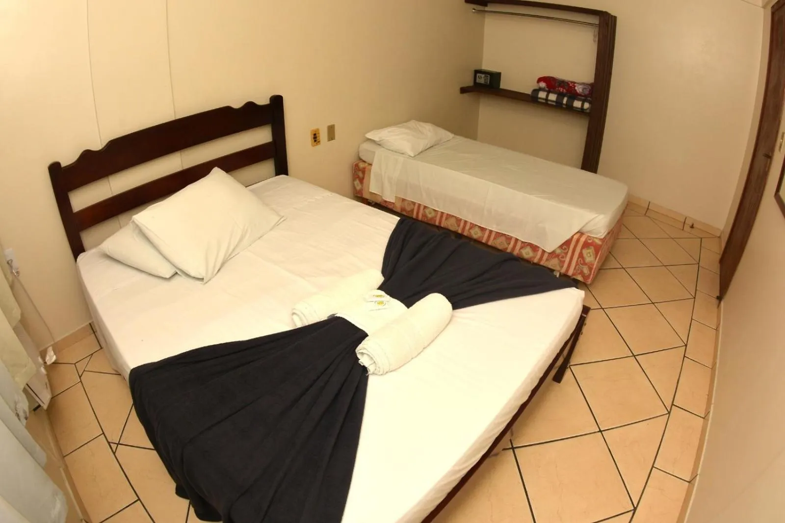 Bed in Hotel Dom Fish