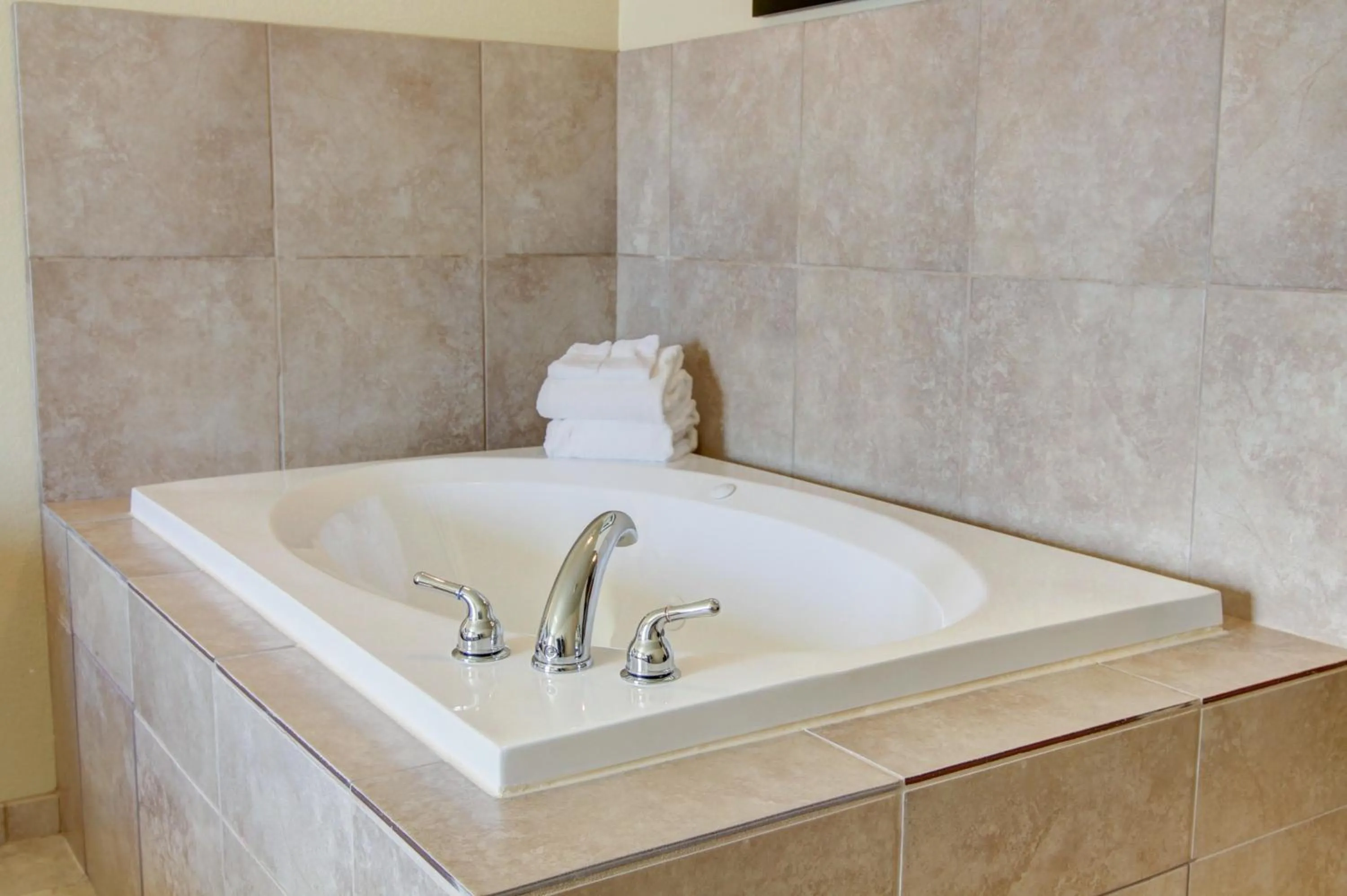 Bedroom in Cobblestone Inn & Suites - Harvey