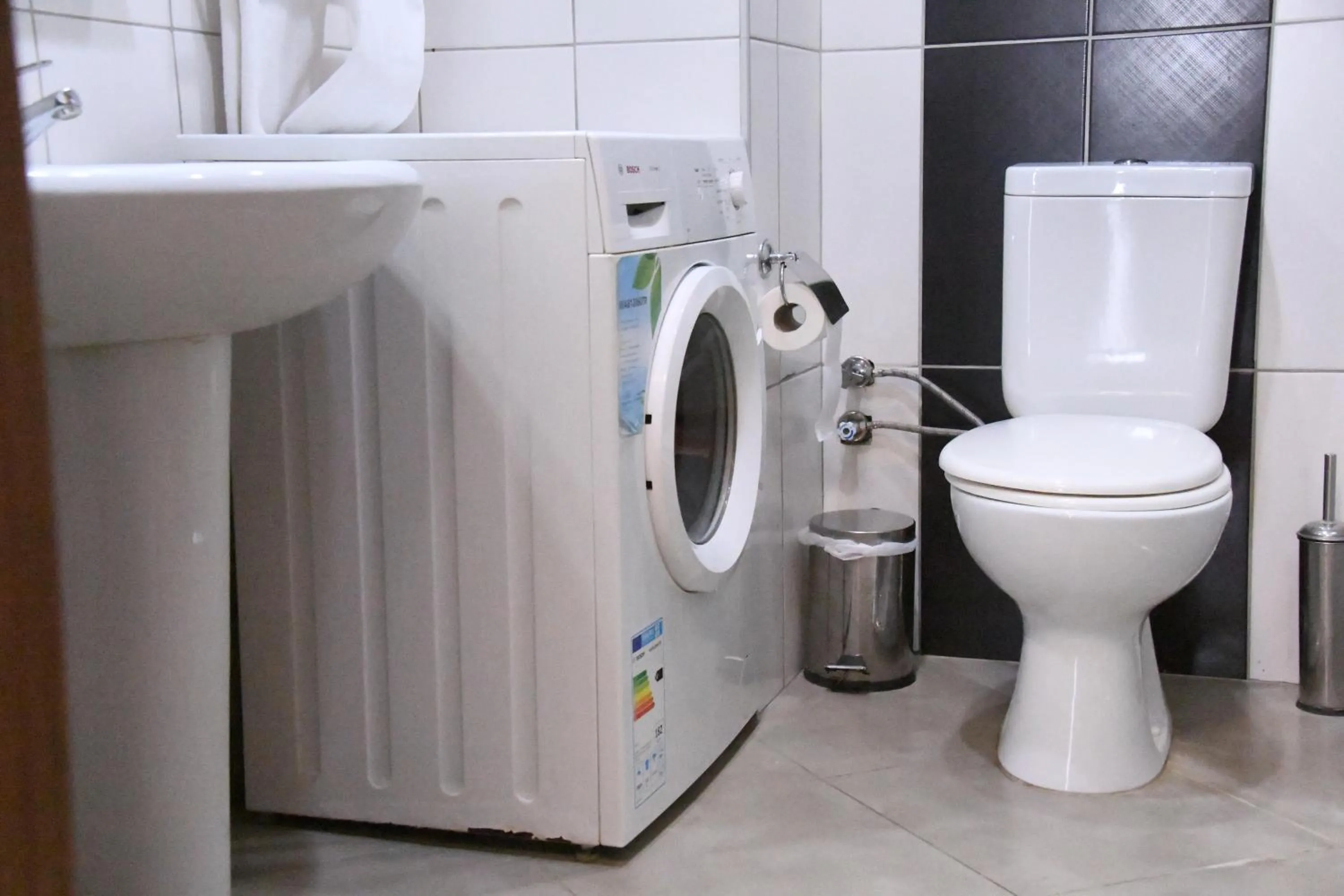 Toilet in A Hotels & Suite