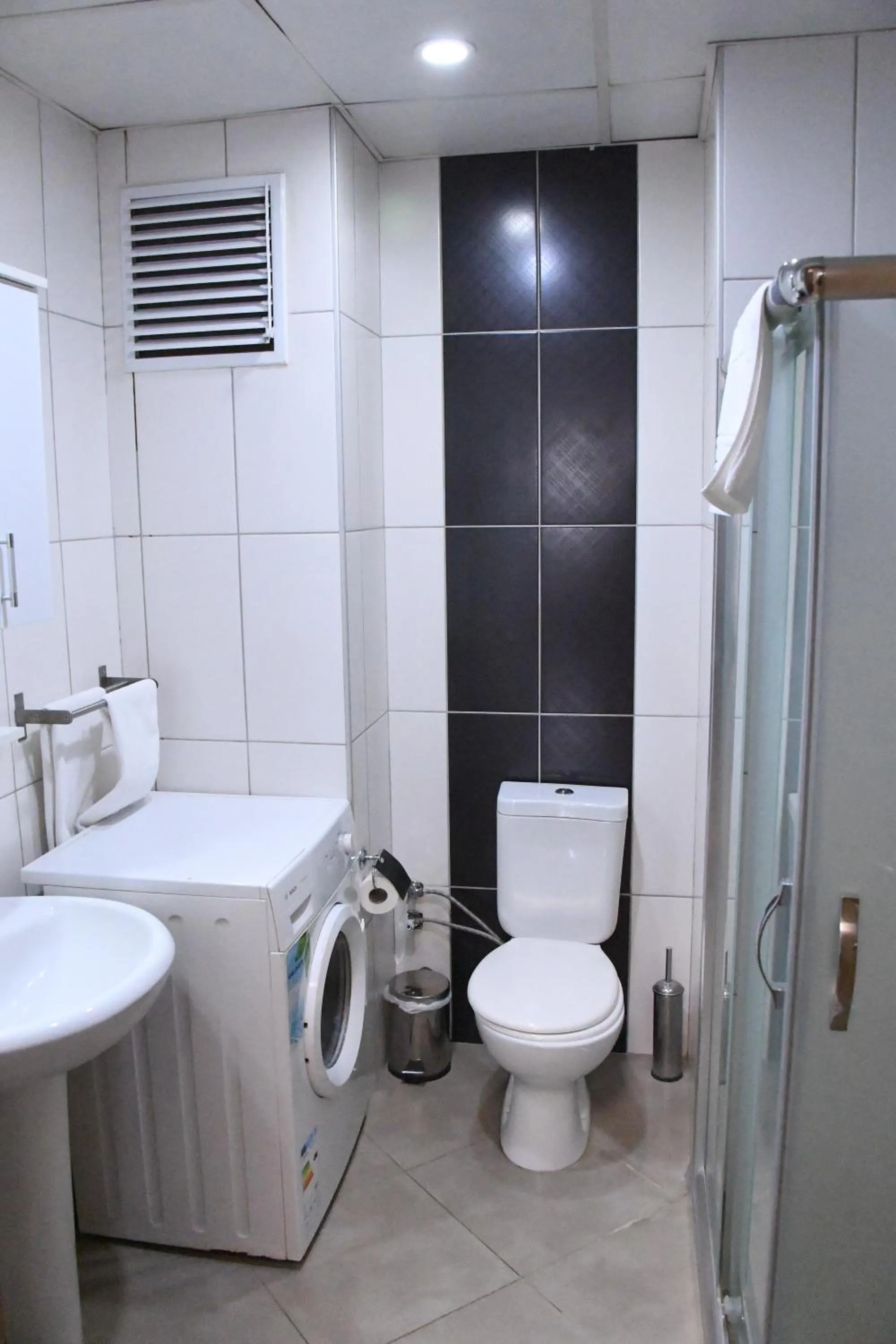 Toilet in A Hotels & Suite