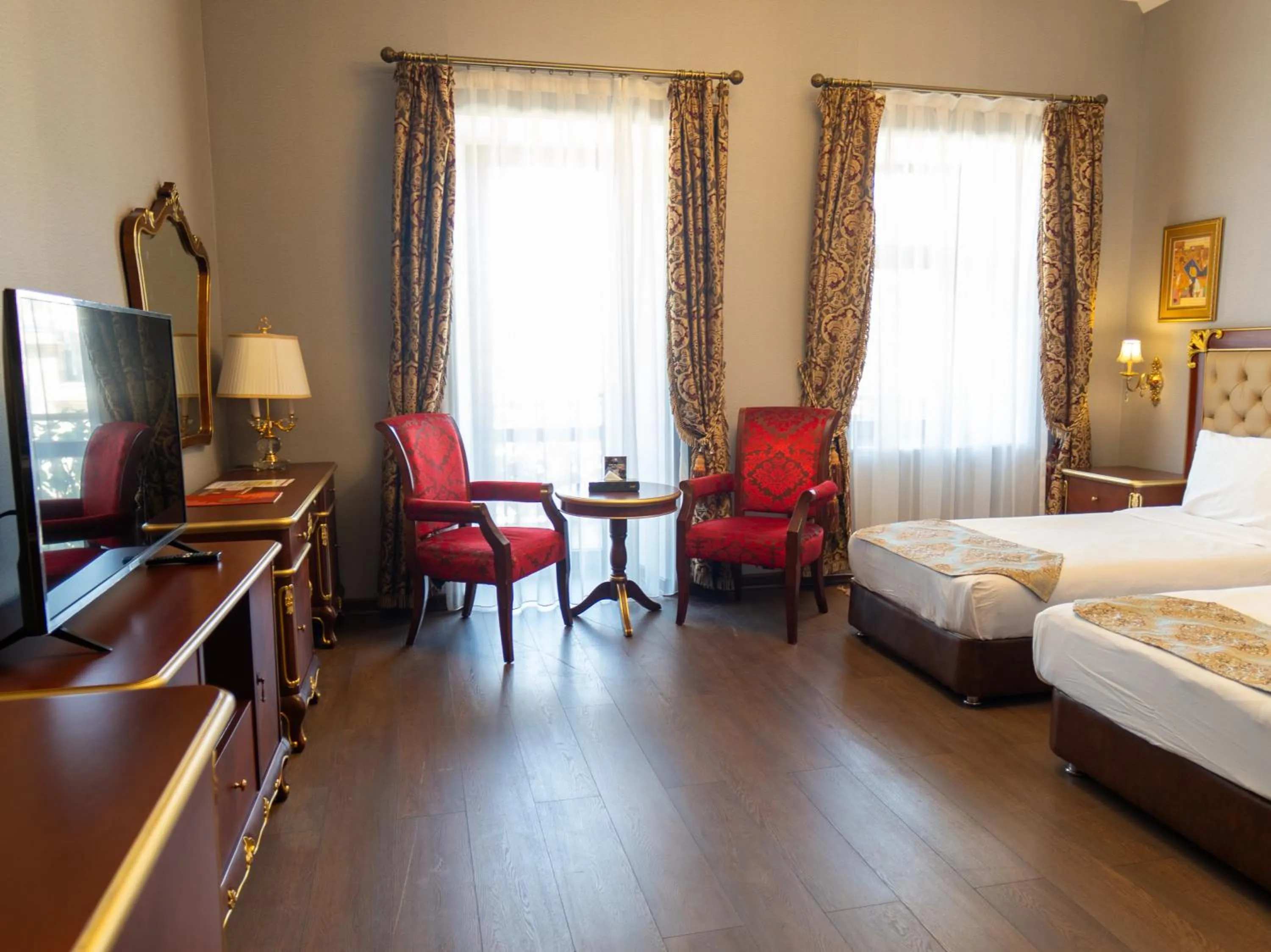 Bed in Shah Palace Luxury Museum Hotel