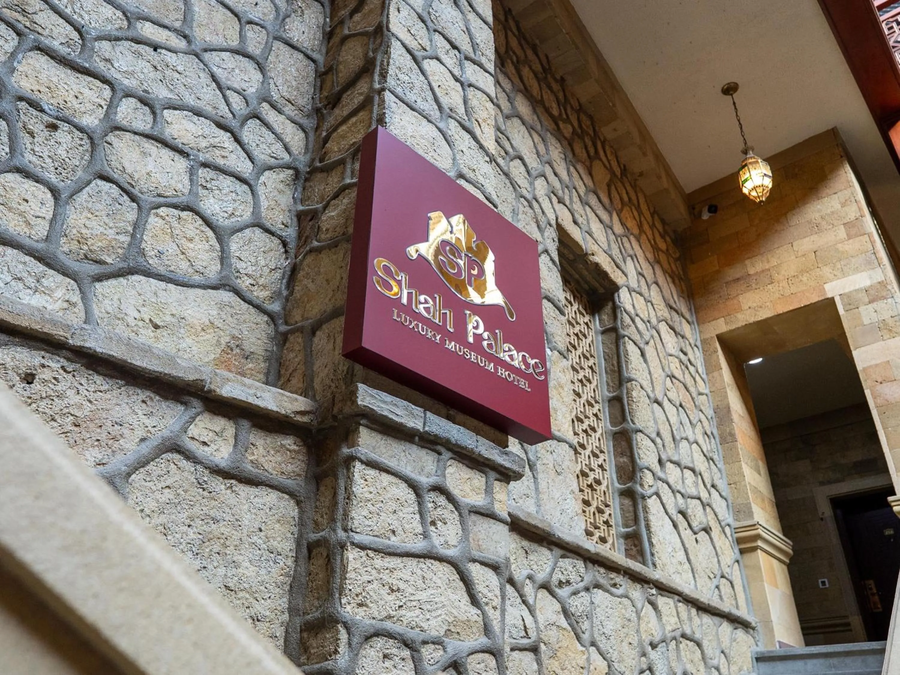 Property logo or sign in Shah Palace Luxury Museum Hotel