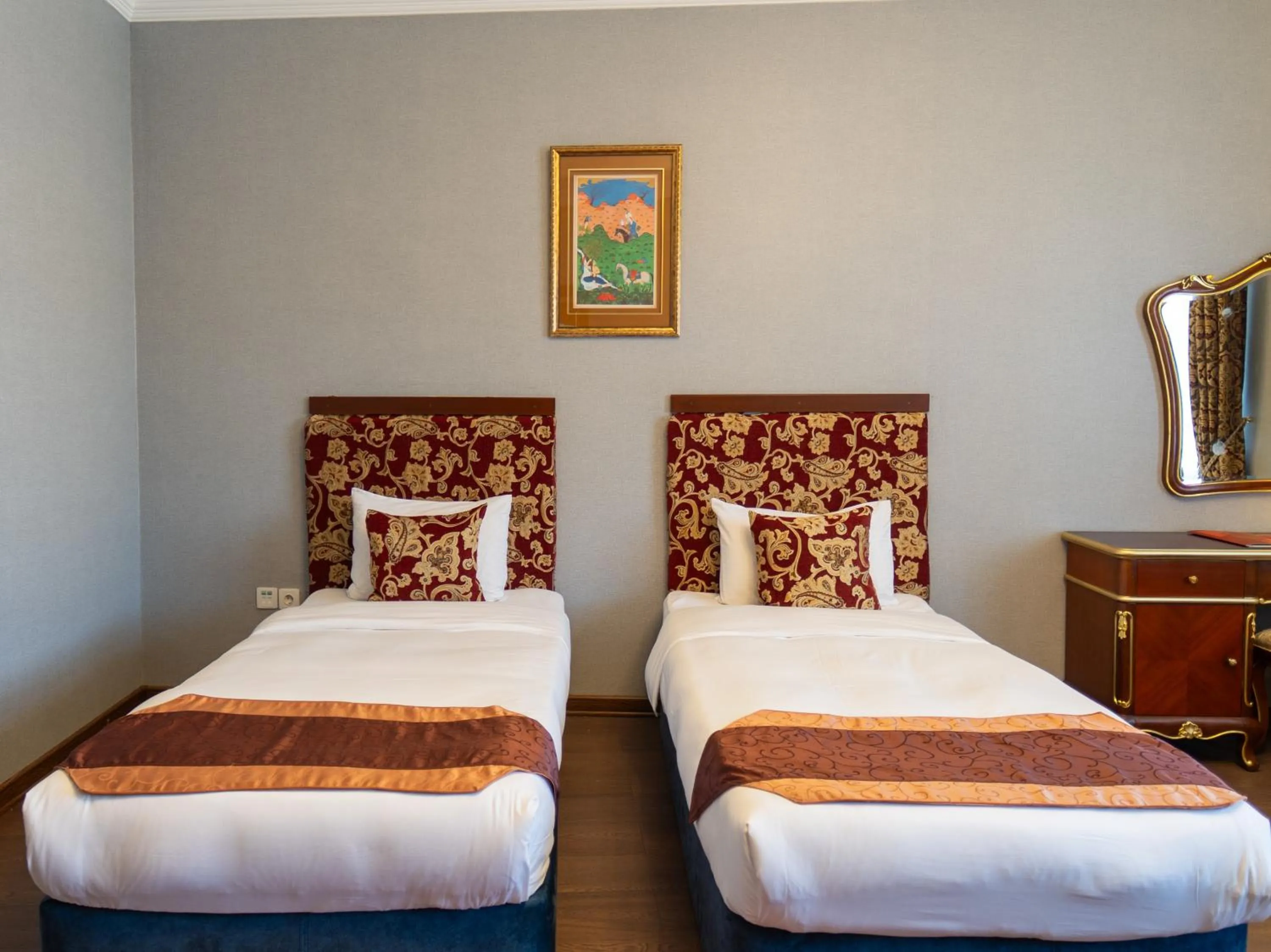 Bed in Shah Palace Luxury Museum Hotel