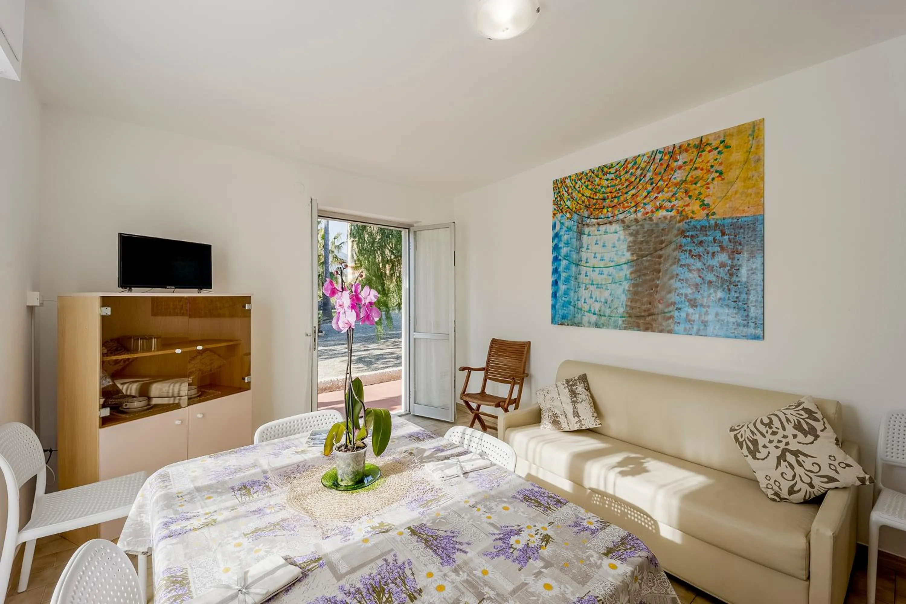 Living room, Bed in Loano Apartment Pool & Garden