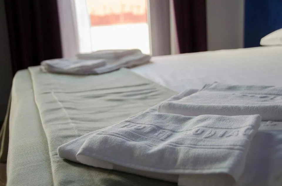 Bed in Hotel Zodiaco