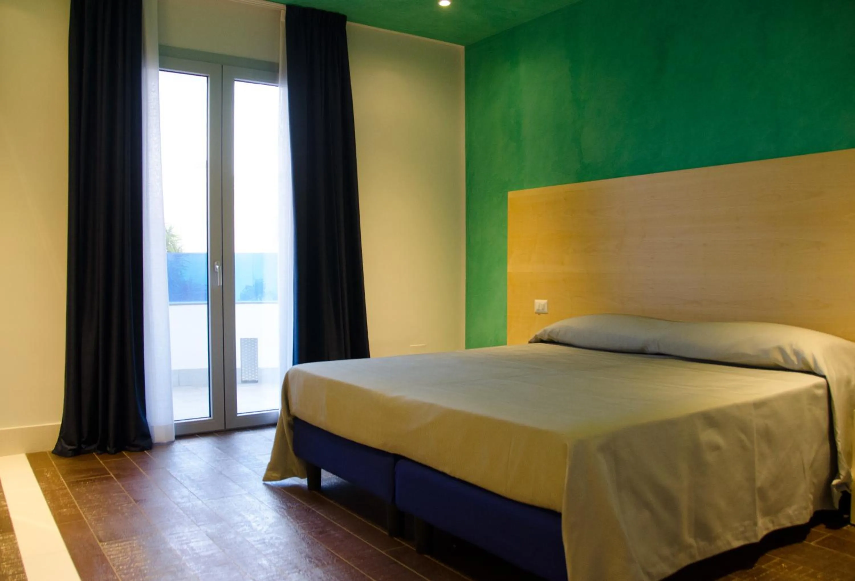 Bed in Hotel Zodiaco