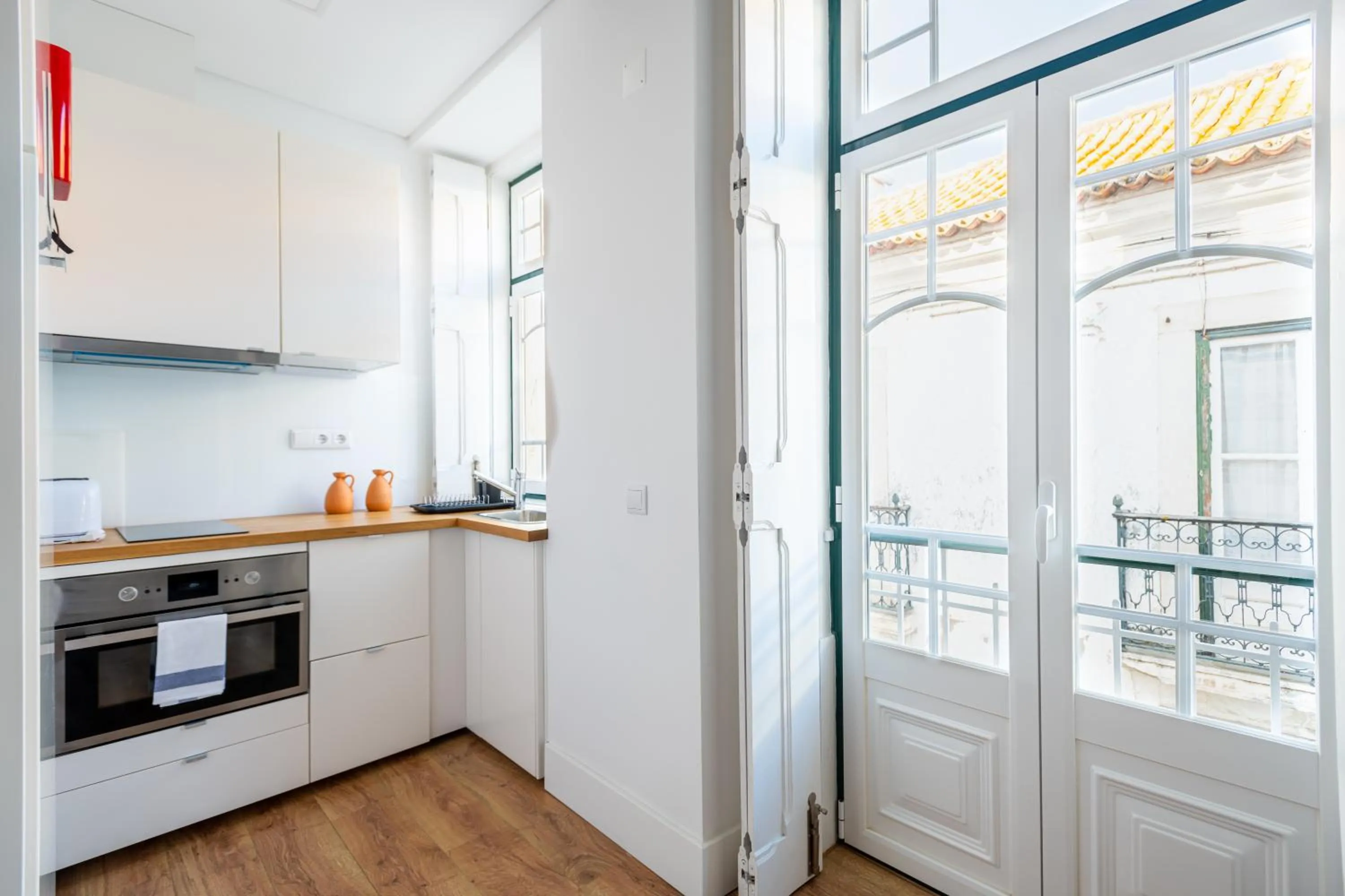 Kitchen or kitchenette in Villa Graça -Hostels and Apartments