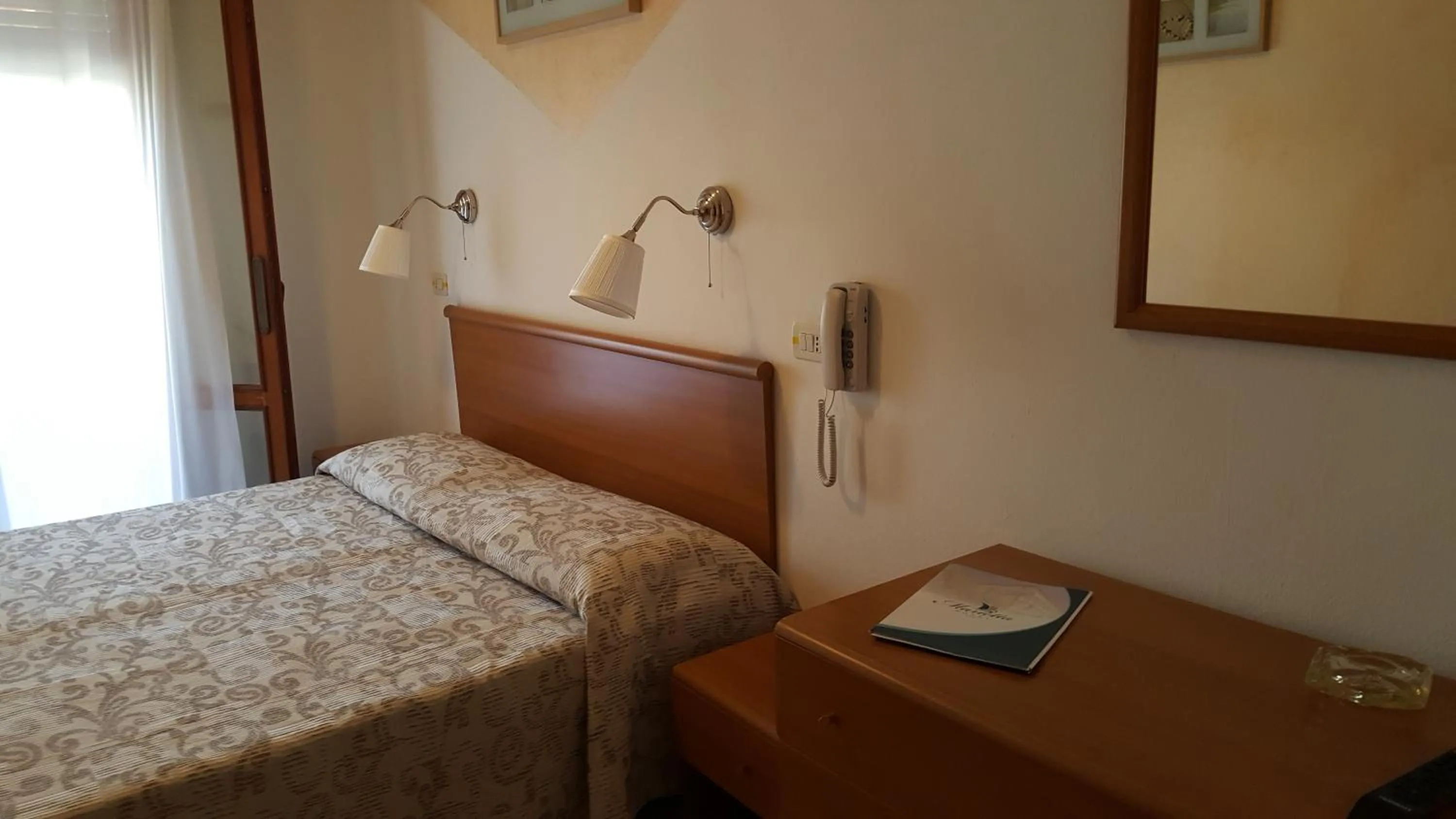 Bed in Hotel Marietta