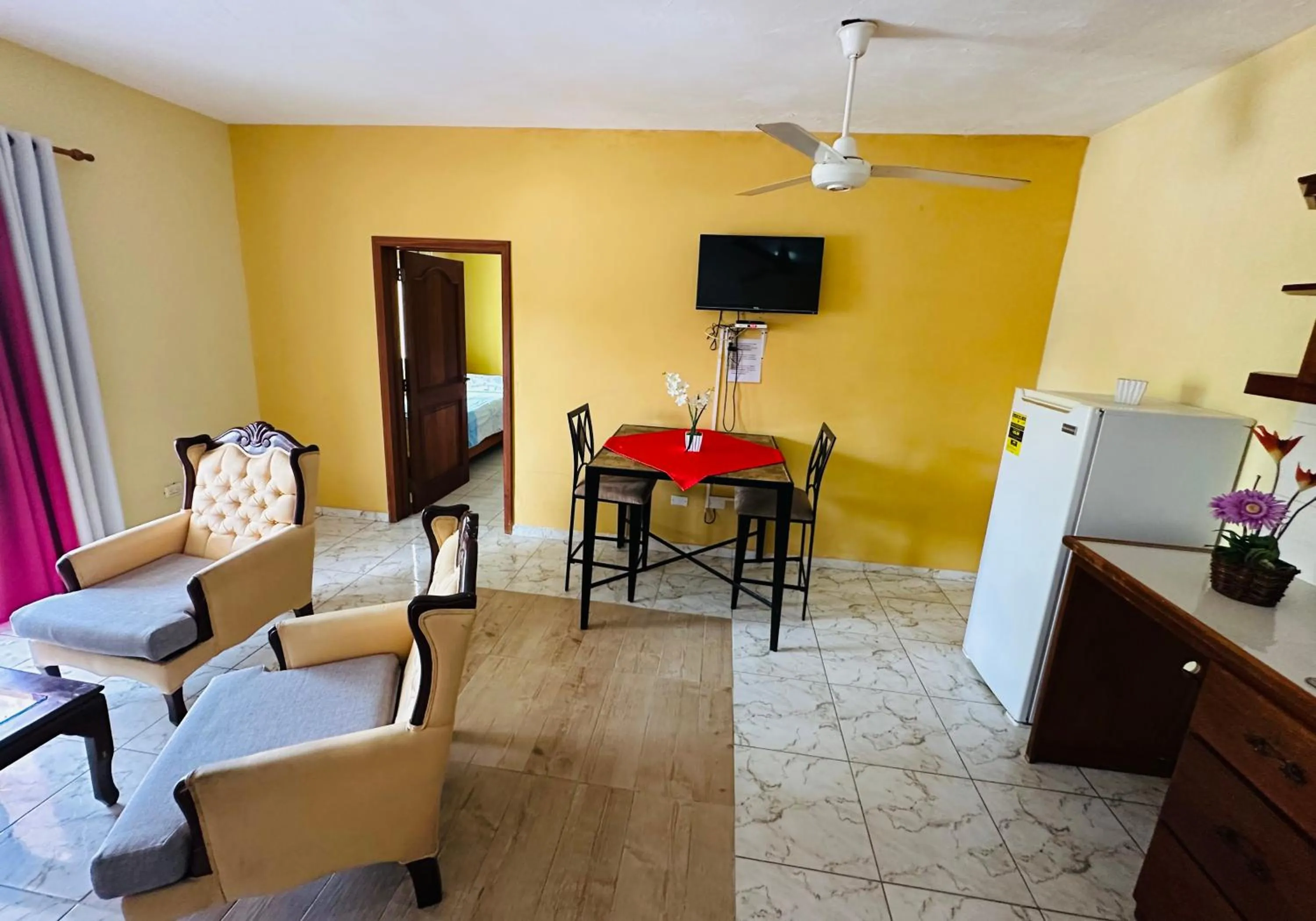 Communal lounge/ TV room in Aparthotel Michaela