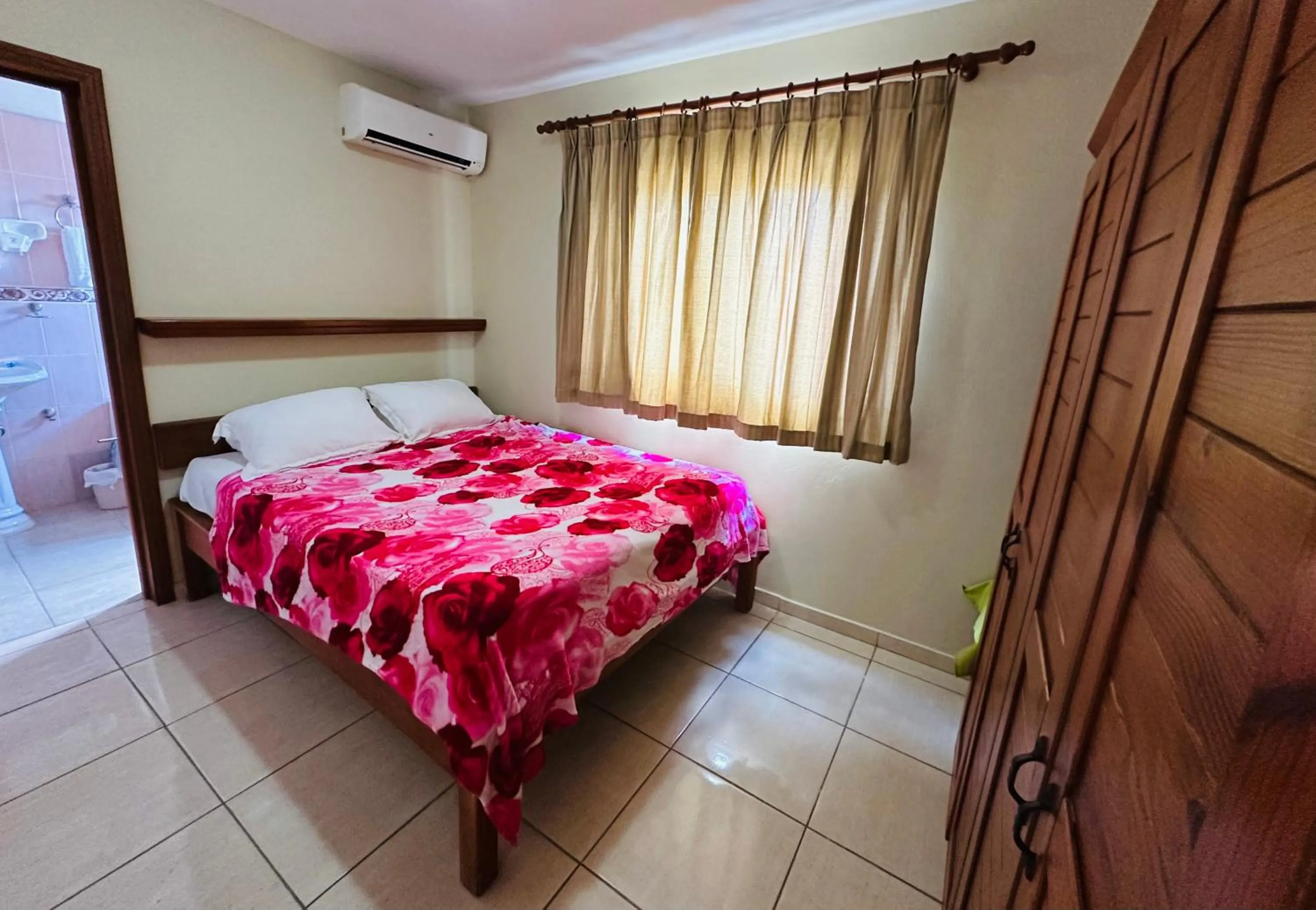 Bed in Aparthotel Michaela