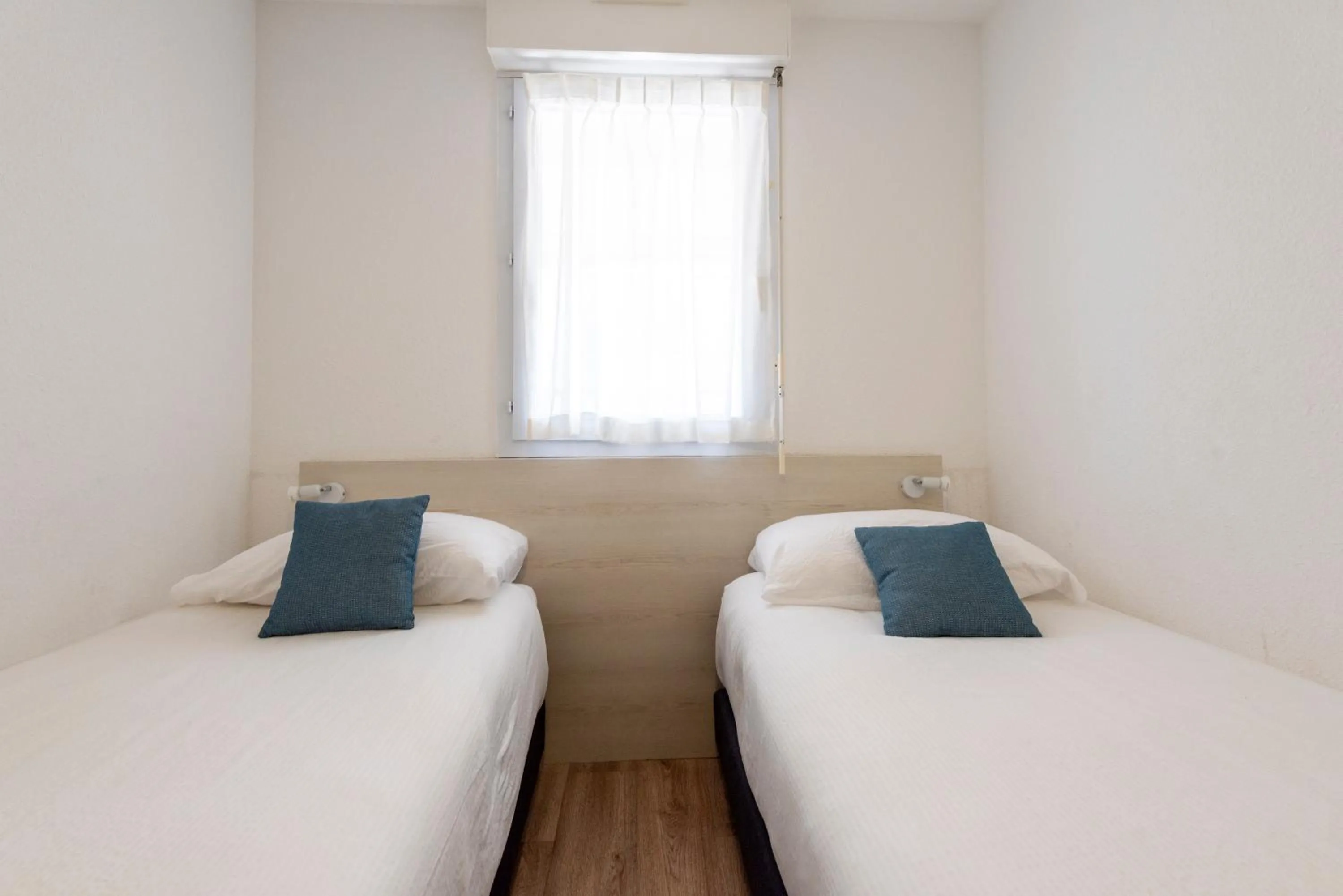 Bed in Côté Thalasso Hôtel & Spa Marin