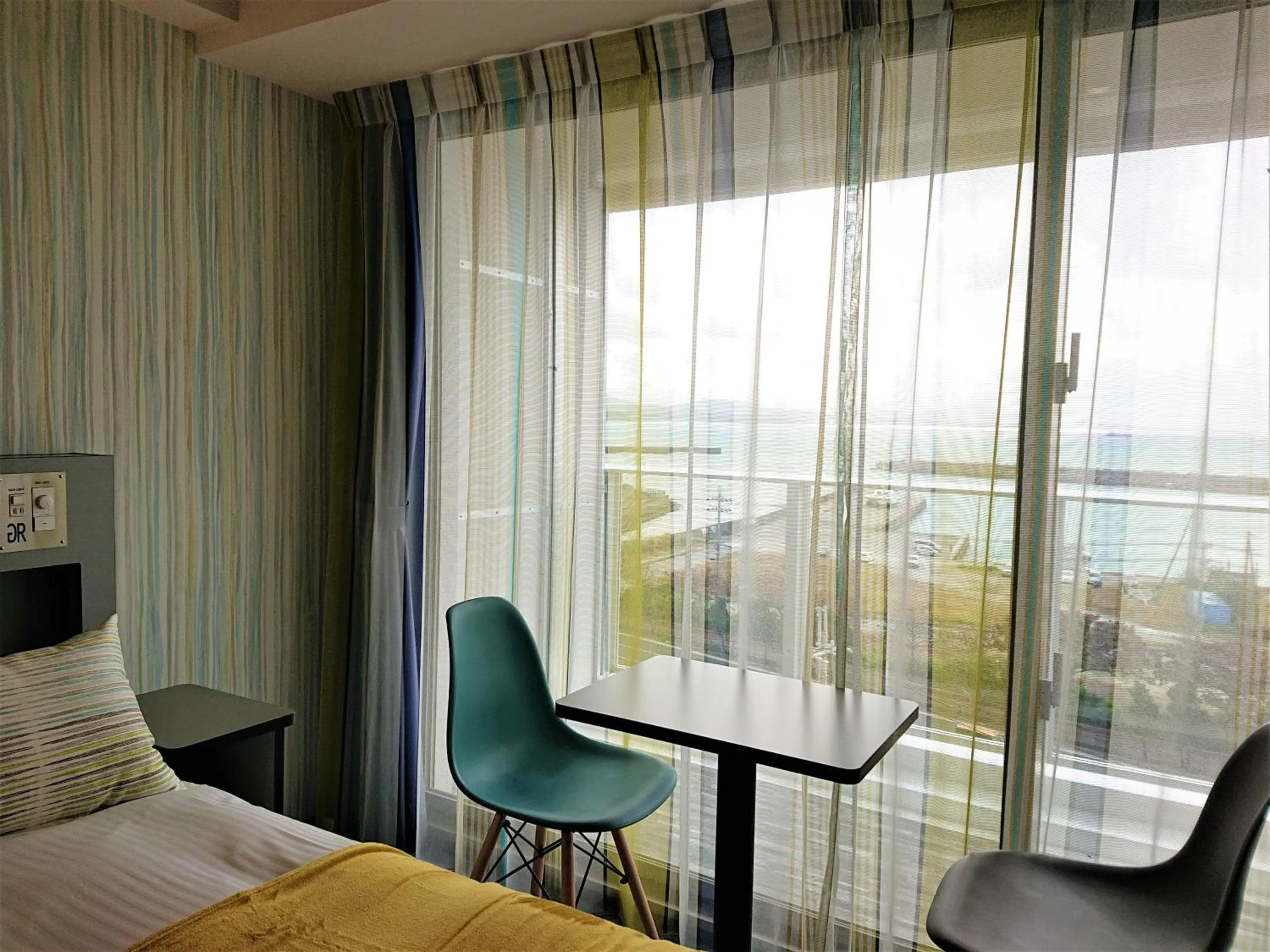 View (from property/room), Bed in Green Rich Hotel Okinawa Nago (Artificial hot spring Futamata Yunohana)