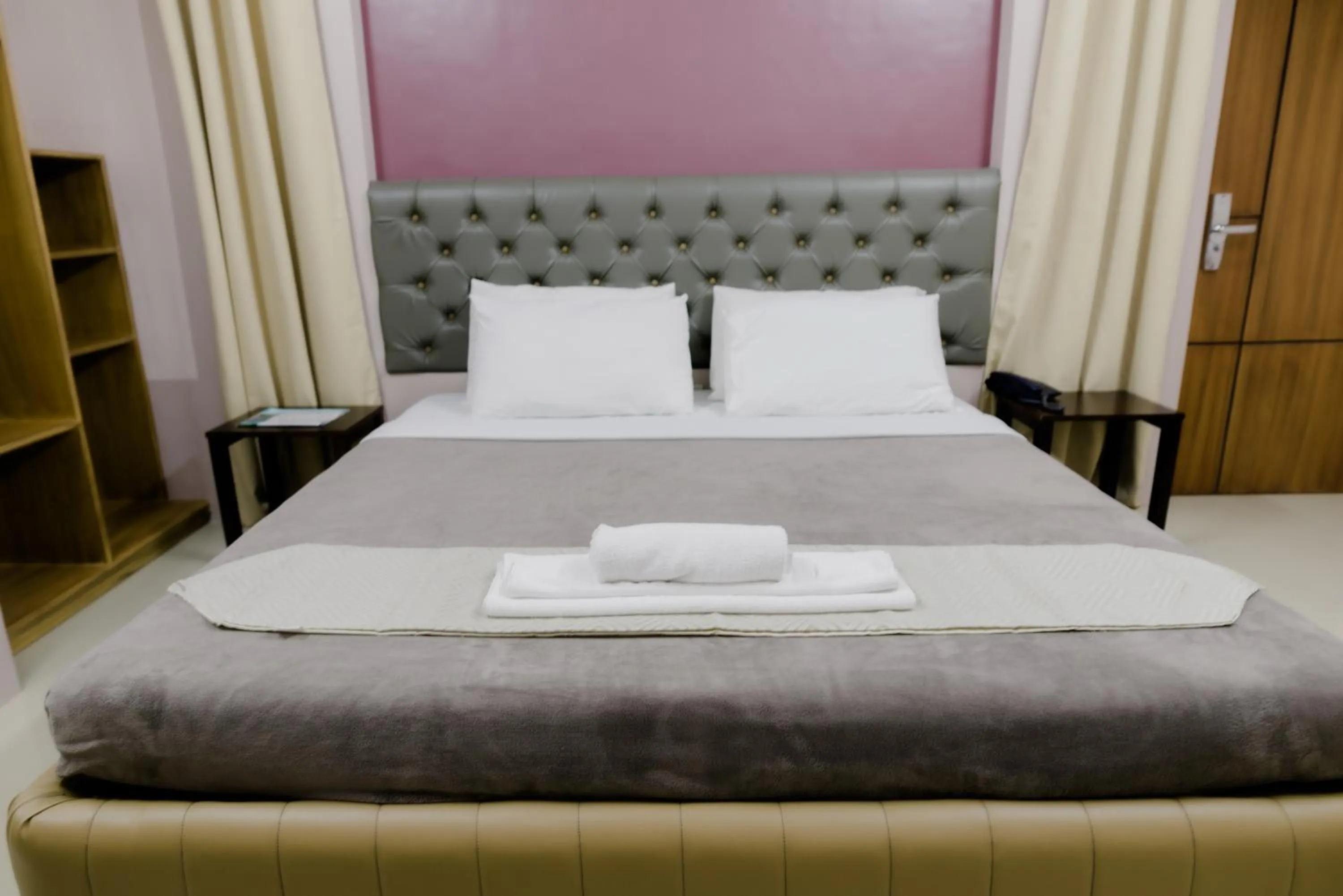 Bed in The Horizon Suites and Arcade