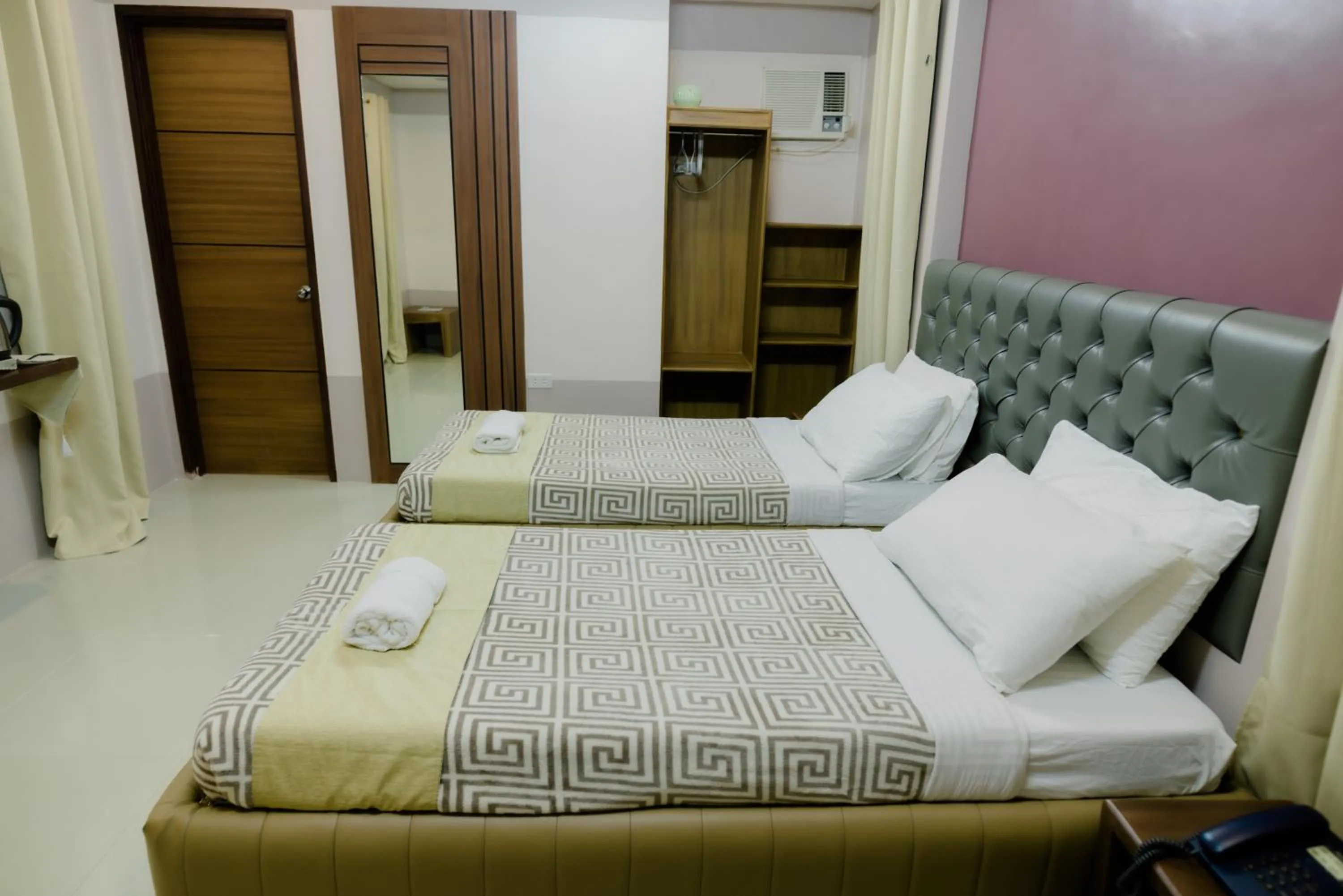 Photo of the whole room, Bed in The Horizon Suites and Arcade